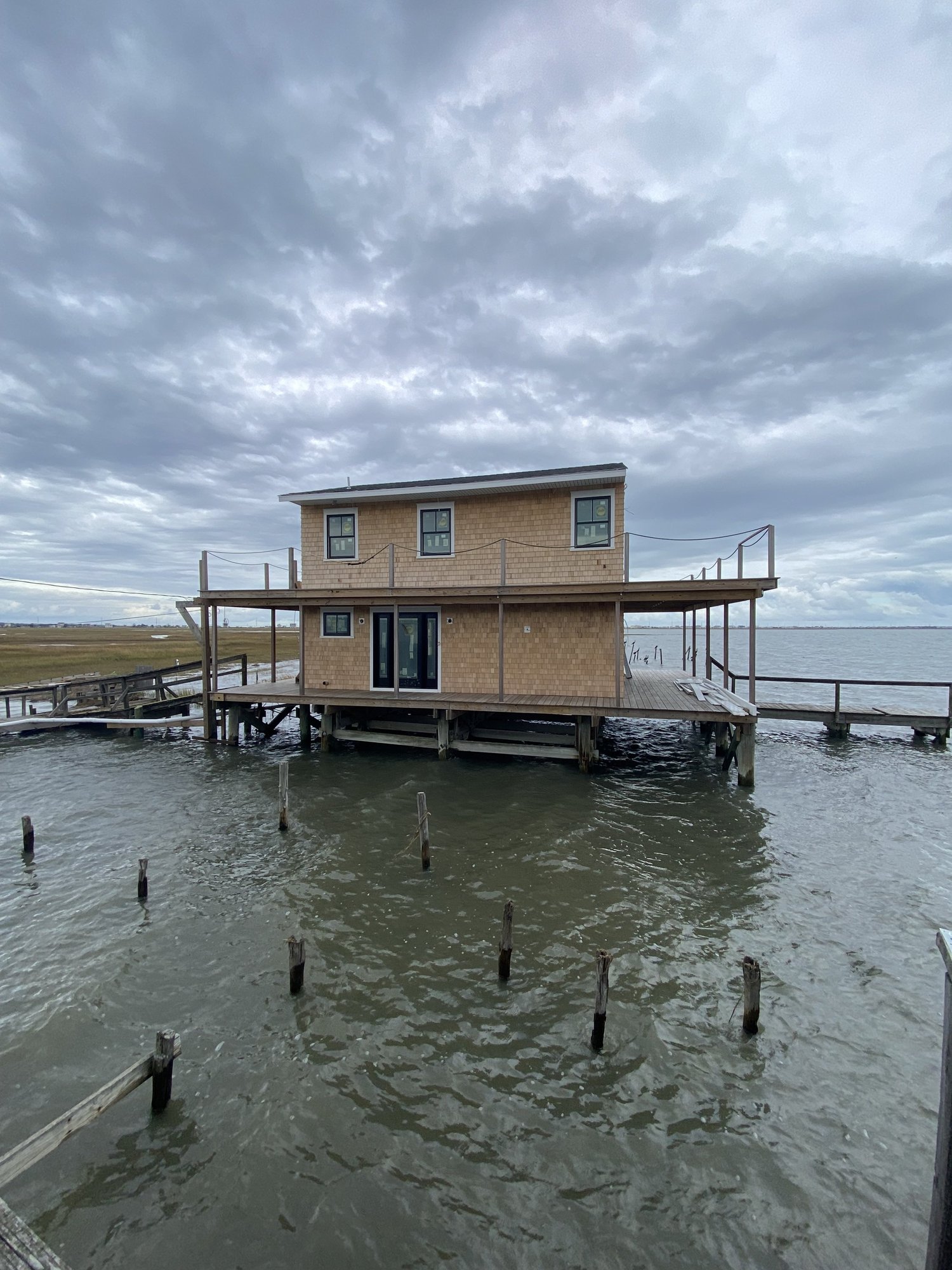 Renovated waterfront home with cedar siding and wraparound deck, Cape May Court House NJ