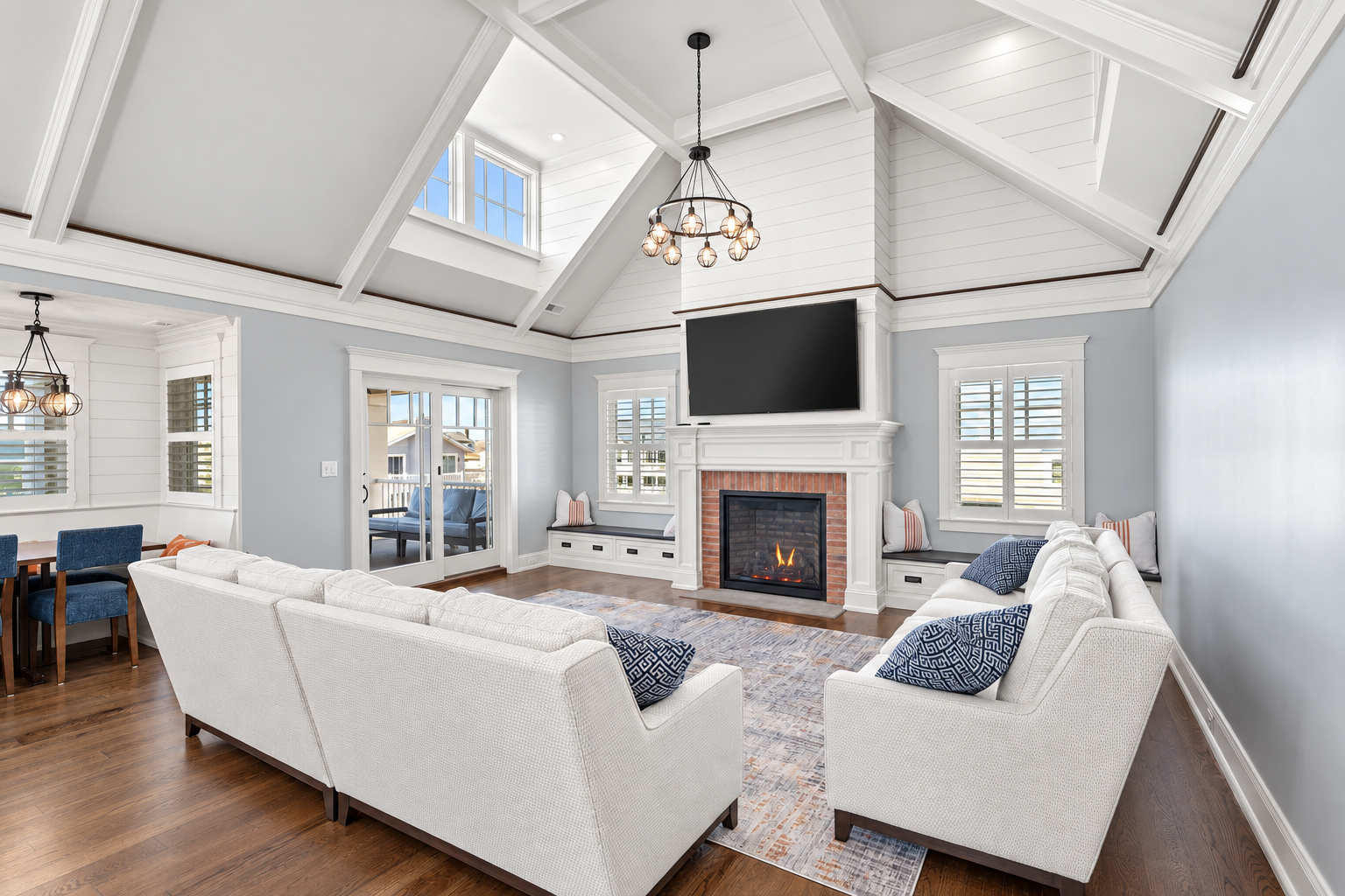 Living room with a gas fireplace under the cathedral ceiling, 213 57th St, Avalon, NJ