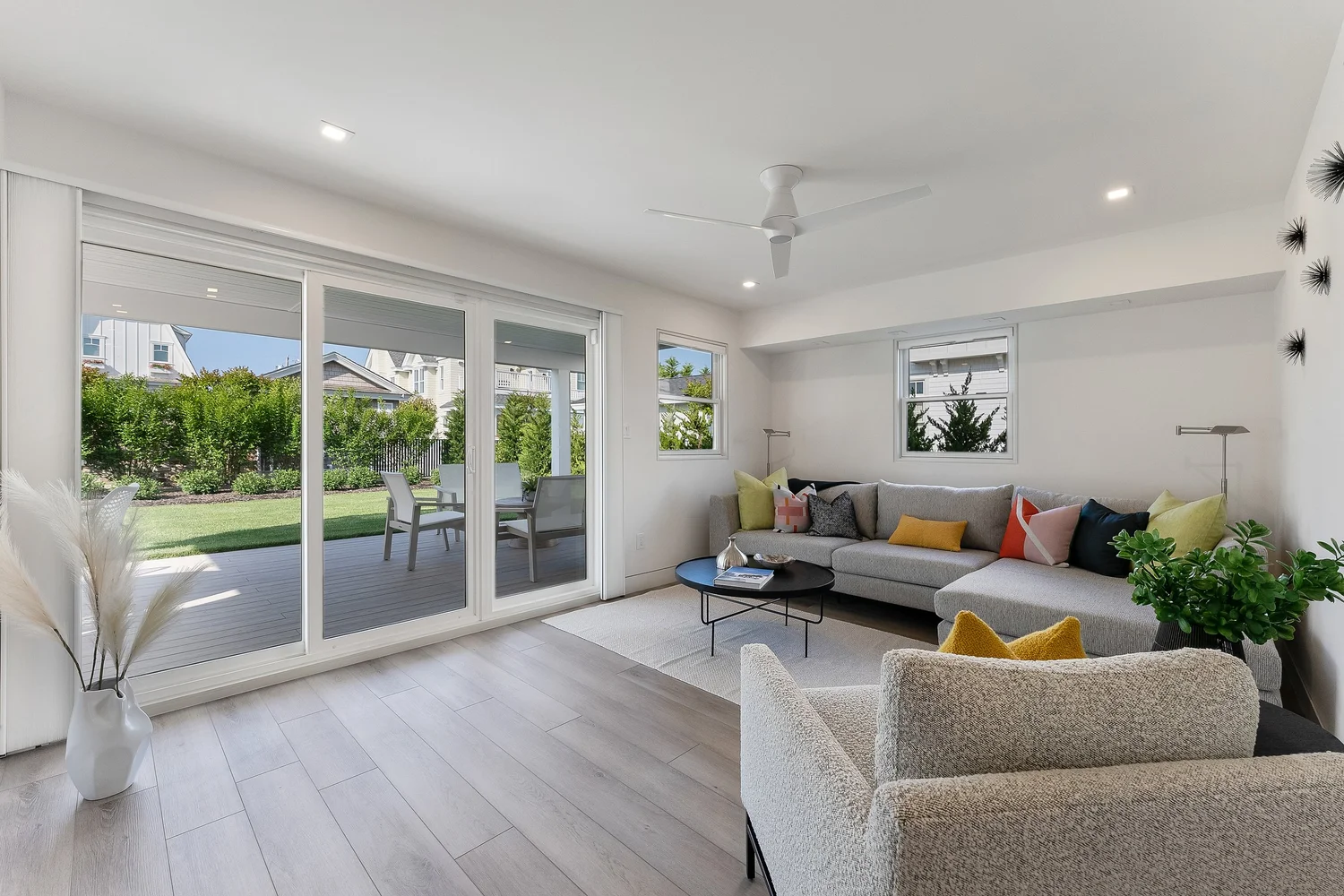 After: renovated family room with new sliders and flooring, 107 116th St, Stone Harbor, NJ
