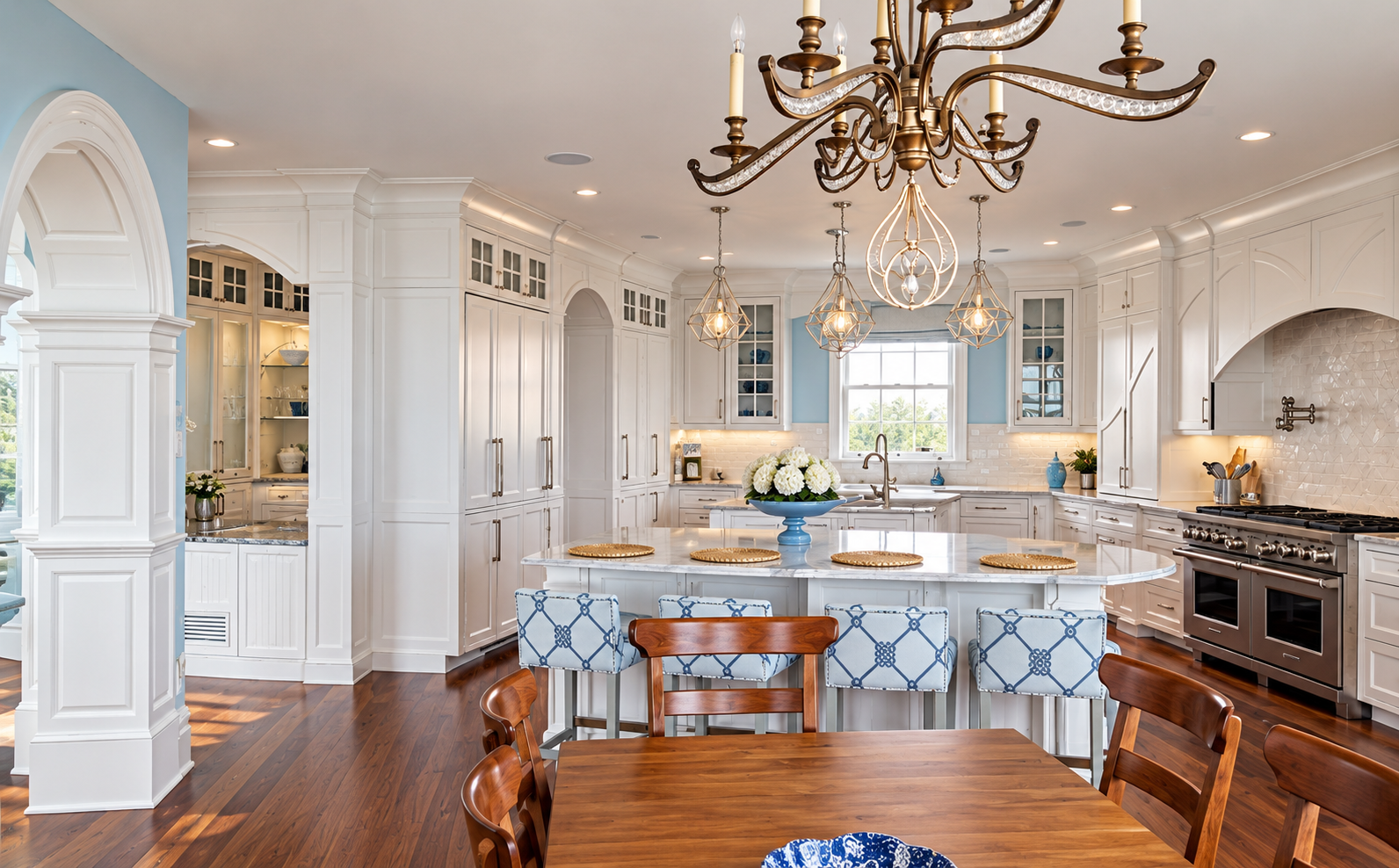 Open kitchen and dining area with a large island and chandelier in a new Avalon, NJ home
