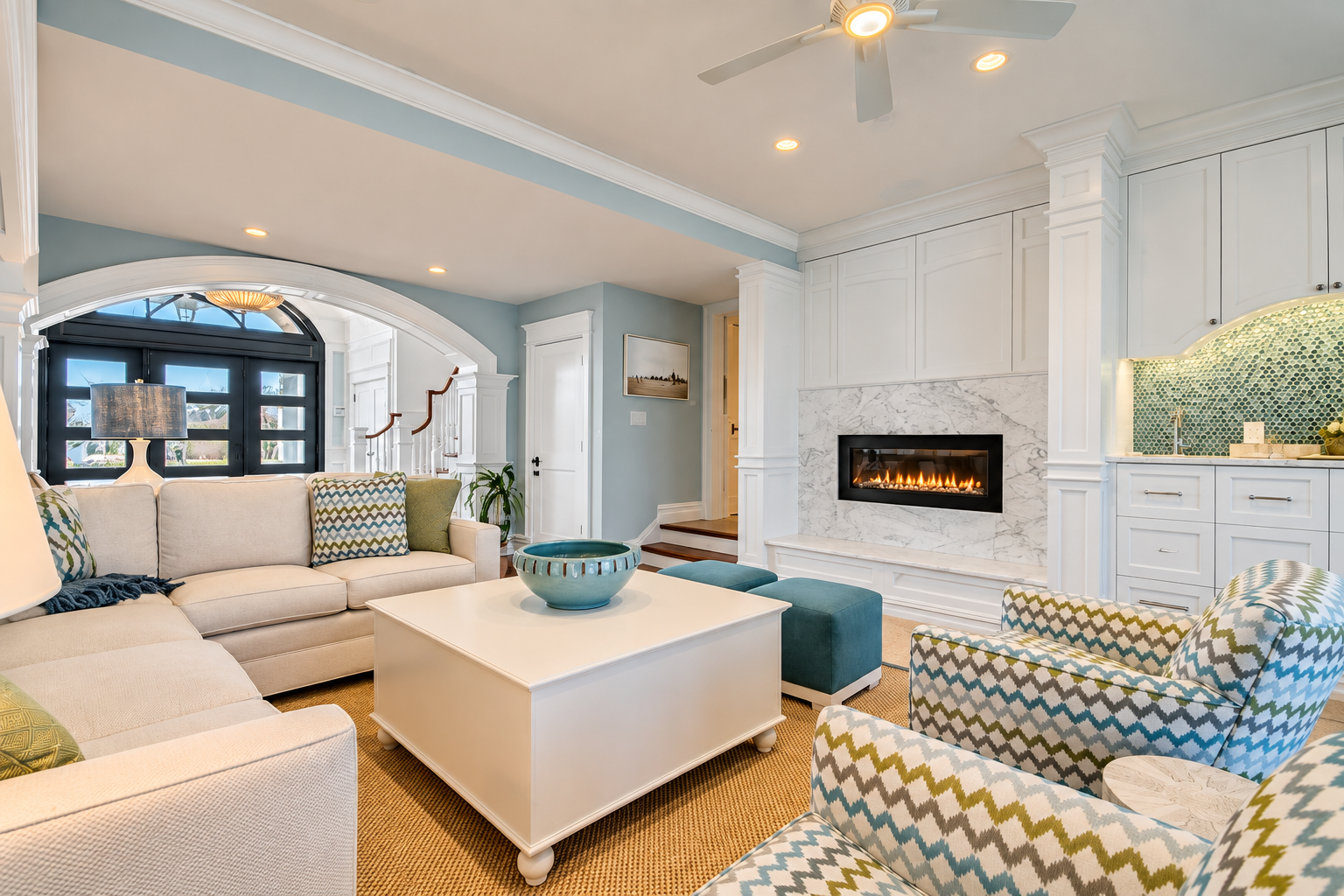 Living room with a fireplace and built-ins in a new custom home in Avalon, NJ