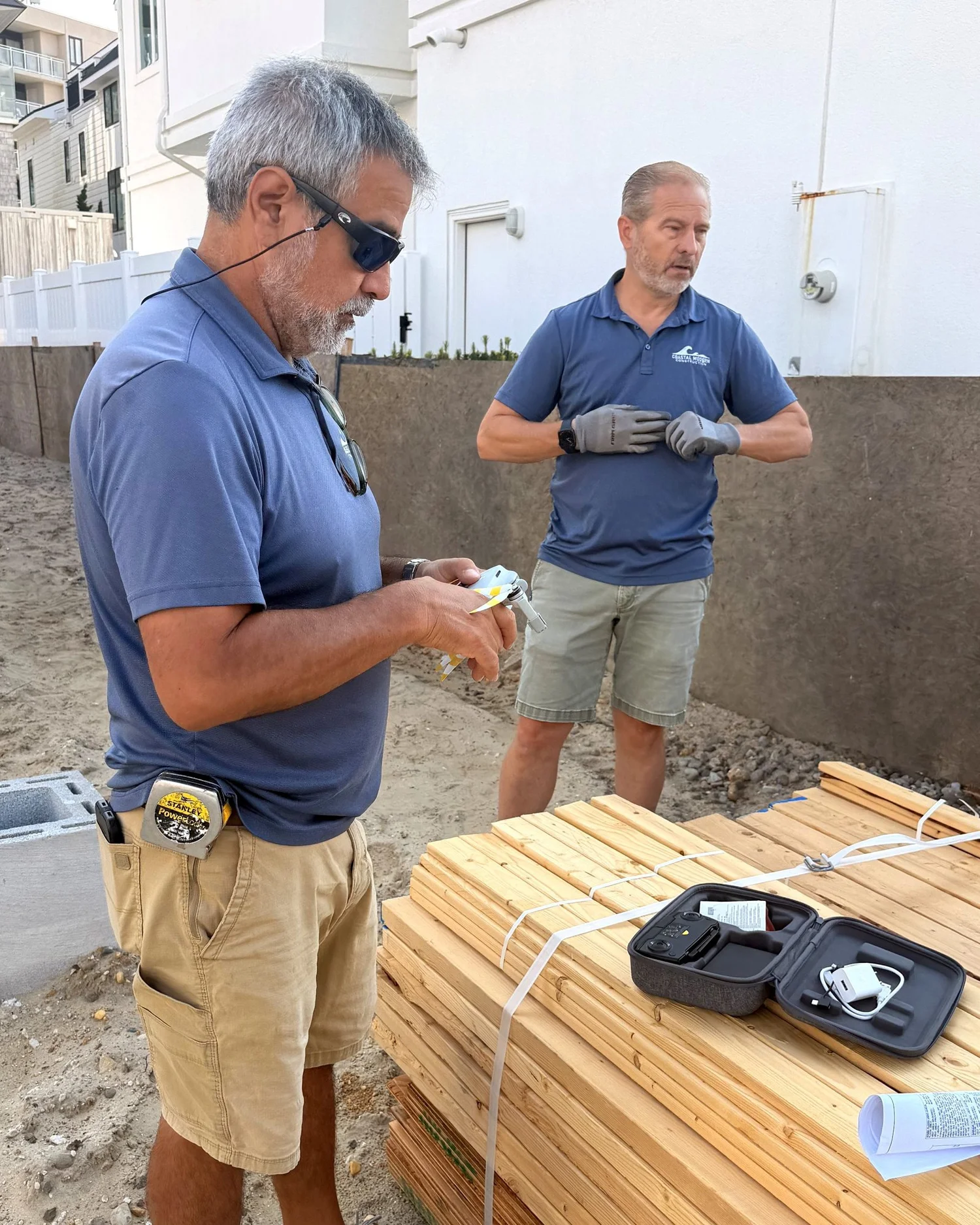 Owners Josh Gartner and Mauricio Morales on a Coastal Modern Construction job site at the Jersey Shore