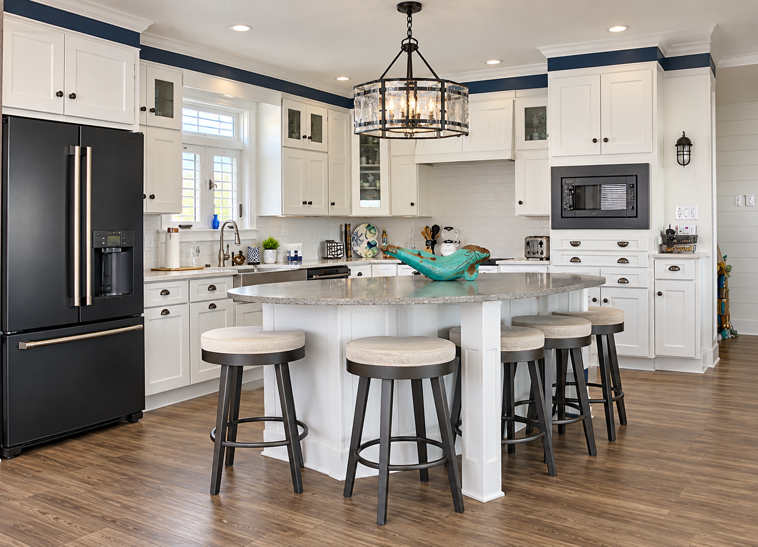 New kitchen with a large island and white cabinets in a renovated Sea Isle City duplex