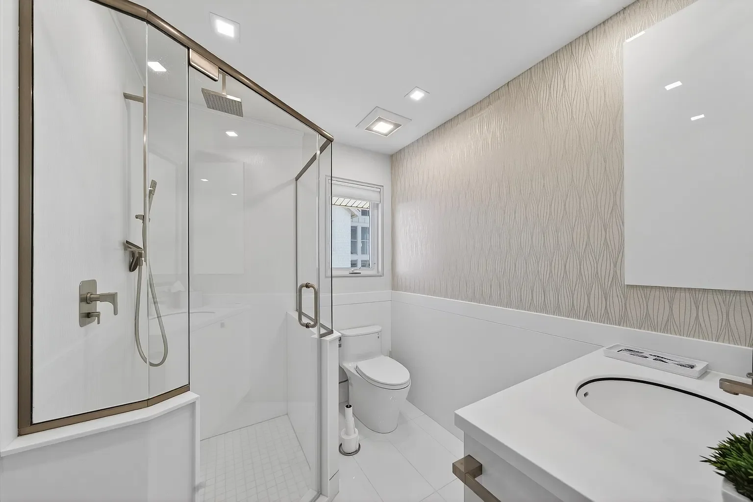 New bathroom with a glass shower and wallpaper accent, 107 116th St, Stone Harbor, NJ