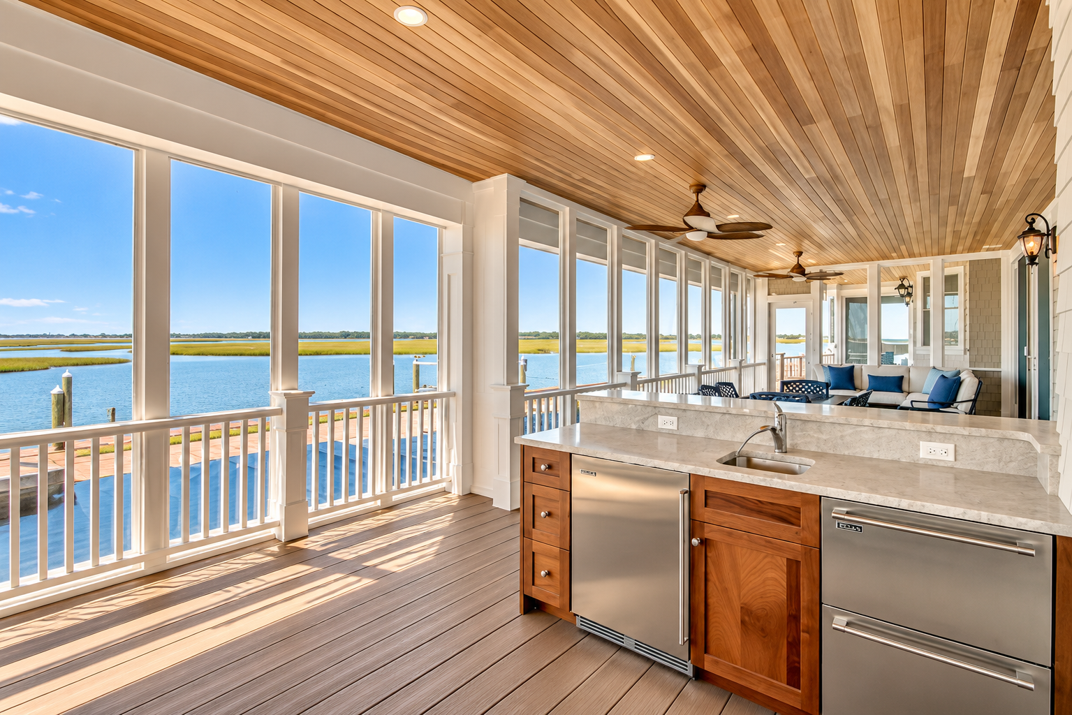 Screened porch with an outdoor kitchen, wood ceiling and bay views at an Avalon, NJ custom home