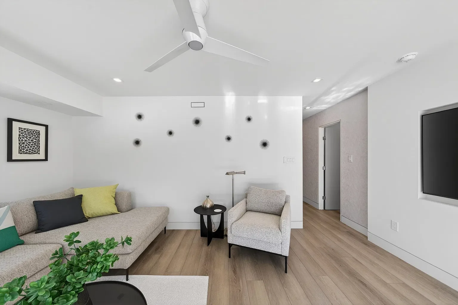 Renovated living room with new flooring, 107 116th St, Stone Harbor, NJ