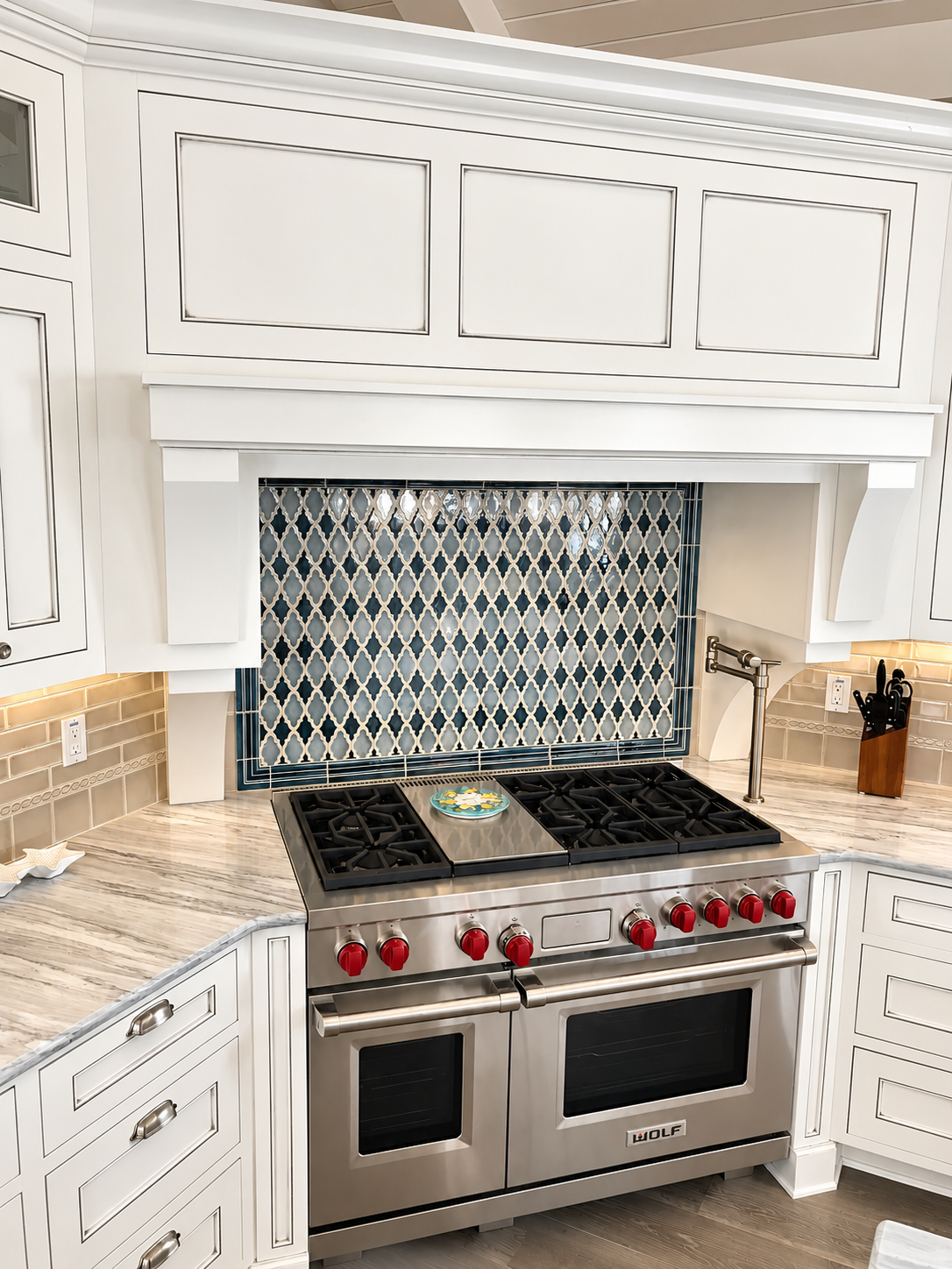 Wolf range with patterned tile backsplash and custom hood, Stone Harbor NJ custom home