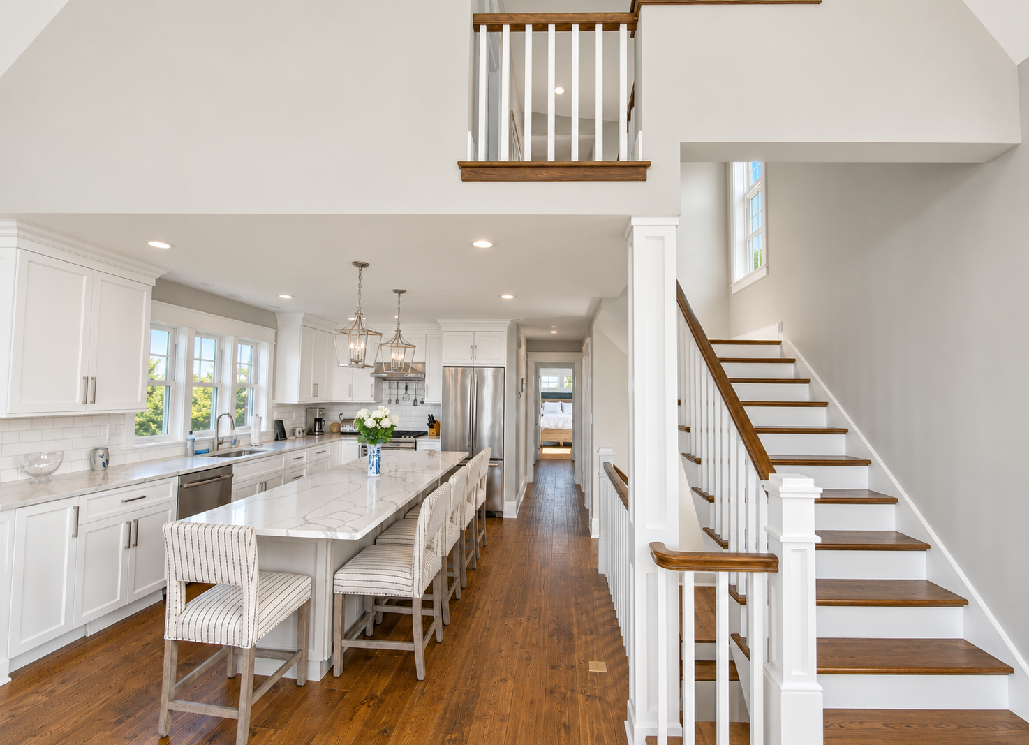 Open kitchen and staircase in a new custom home in Avalon, NJ