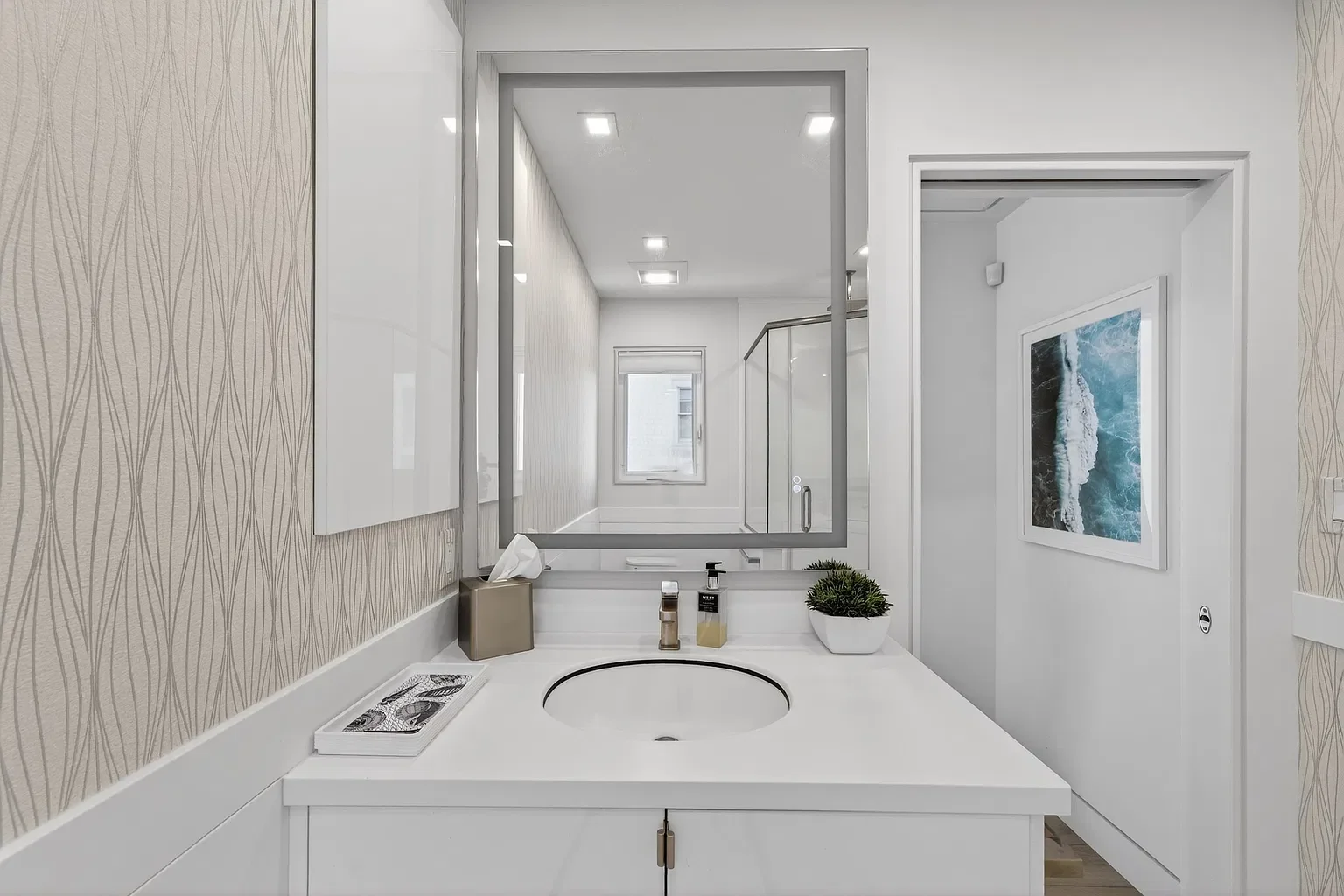 New bathroom vanity with a lighted mirror, 107 116th St, Stone Harbor, NJ
