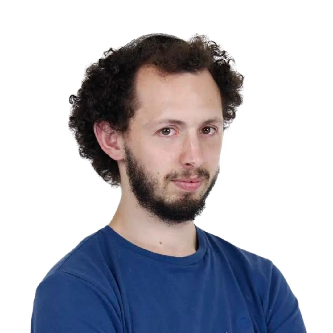 Head and shoulders photo of Ori Kagan wearing a blue longsleeved t-shirt
