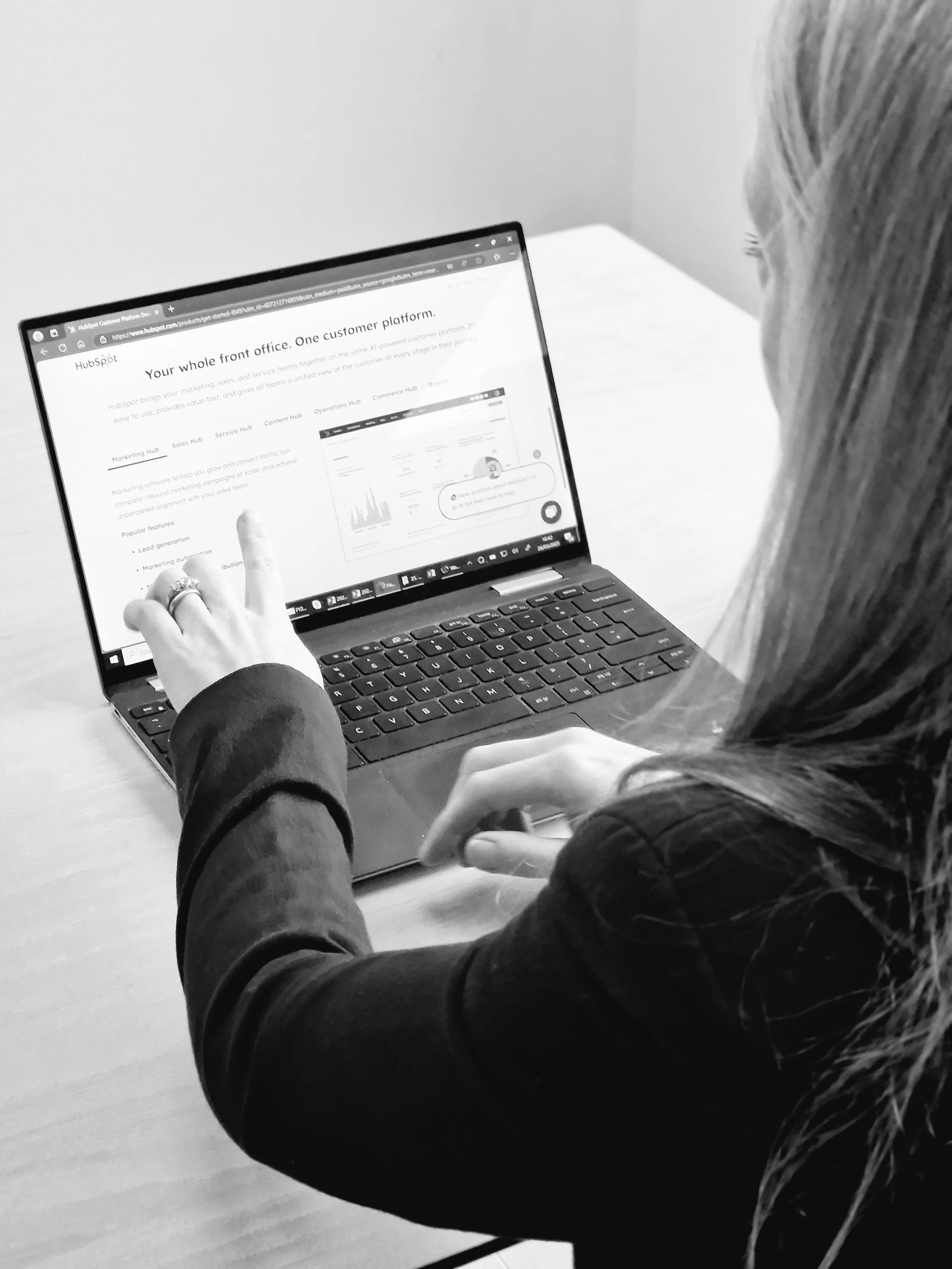 CRM specialist working with dashboard for a business in St Albans