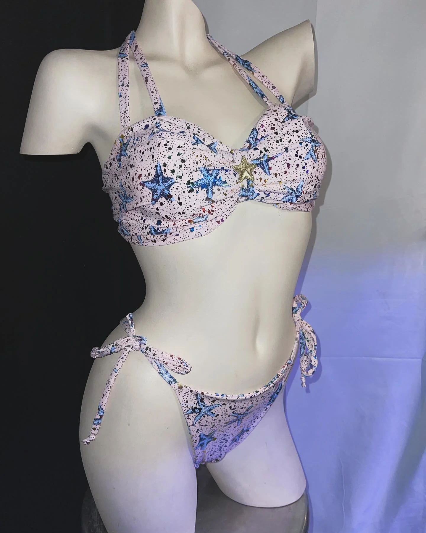 Mannequin wearing a star-patterned bikini.