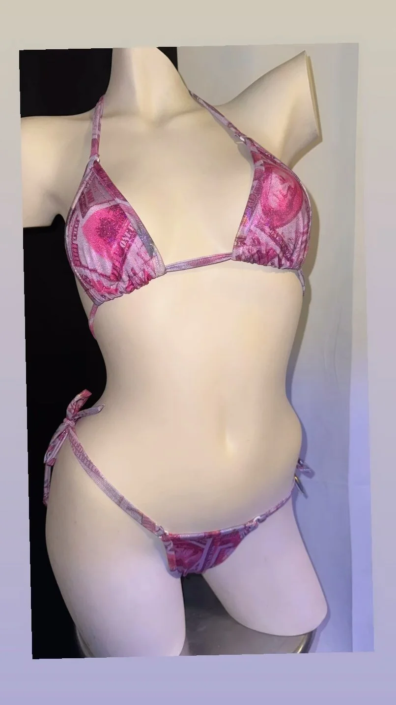 Mannequin wearing pink printed bikini