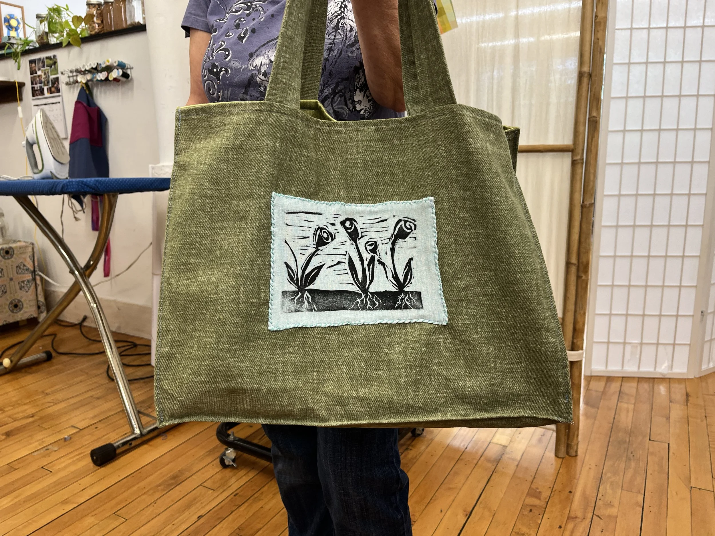 A lovely bag made with rescued fabric and a print by the maker herself.