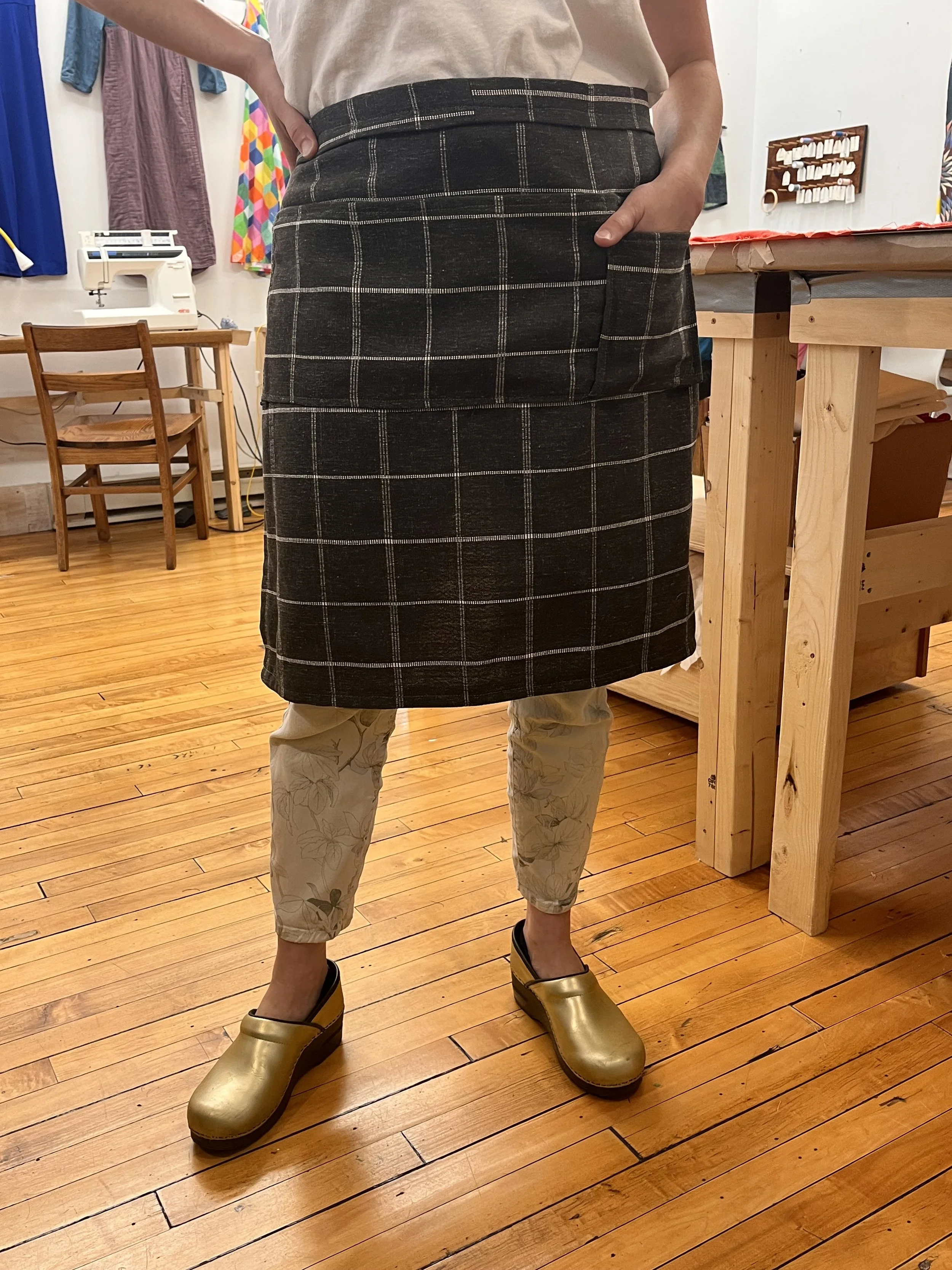A lovely work apron made of fabric from Sticks and Bricks in downtown Northampton and made by a student in the Beginner Sewing class at Grove House sewing Studio