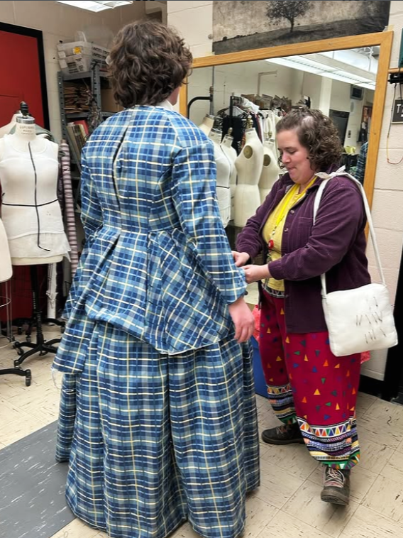 Tilly Adams fitting a garment on an actor.  Tilly is a guest teacher at Grove House Sewing Studio in Florence and Northampton MA and will be teaching pattern drafting