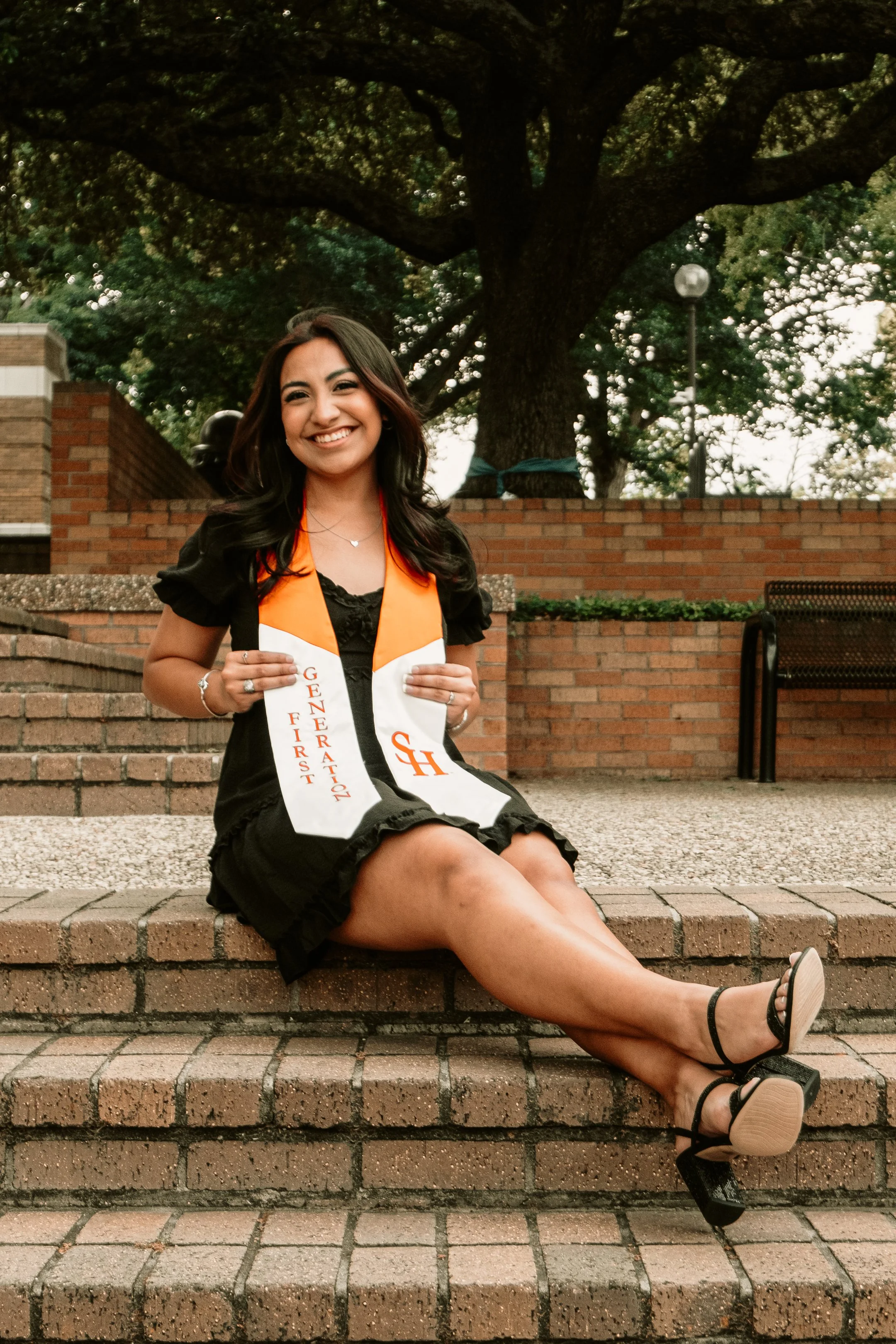 A young woman in a university graduation photos Dalals 