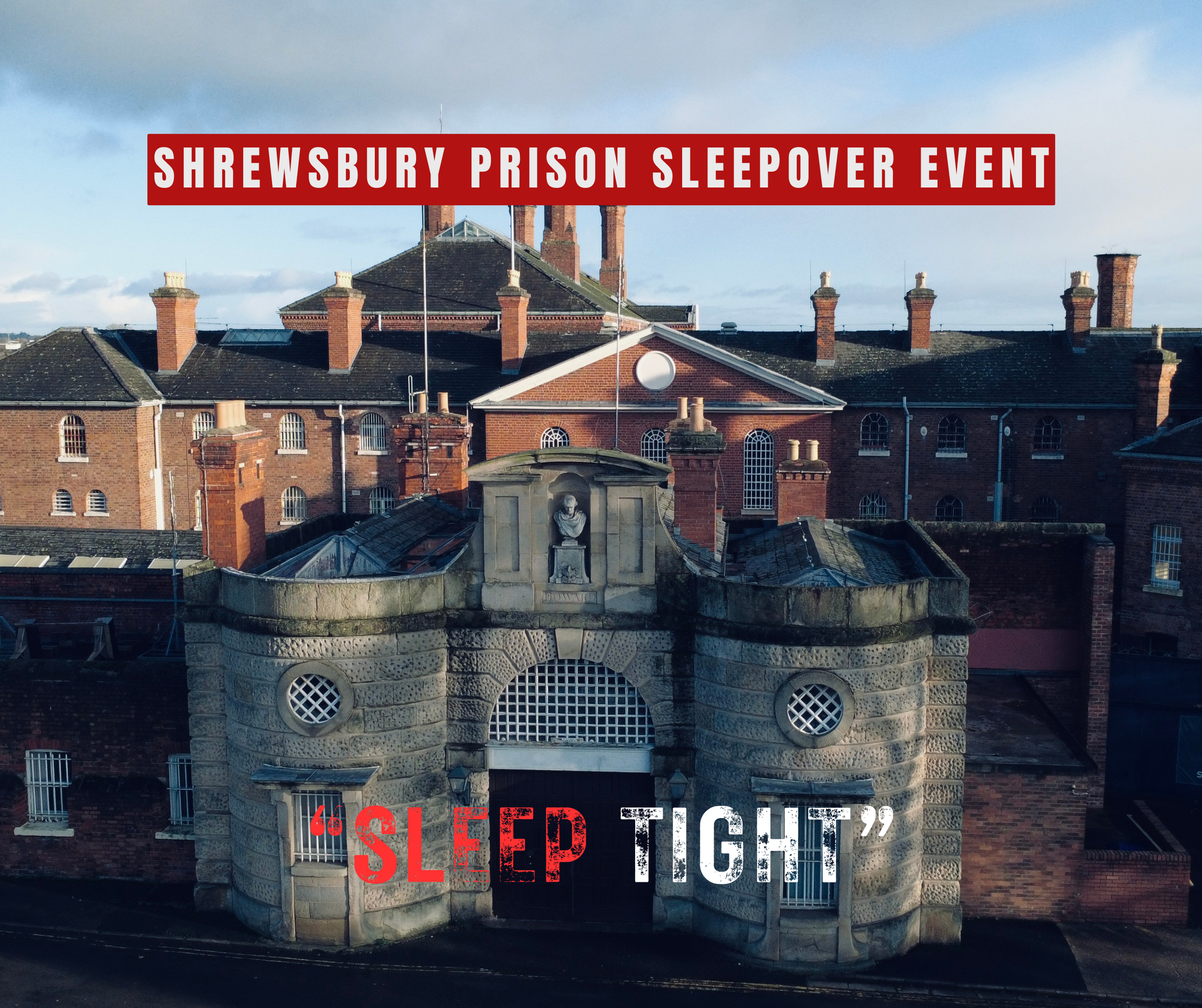 An aerial view of a large brick building with multiple chimneys and arched windows, with a stone entrance gate featuring a sculpture of a head and a crossing gate, with weathered stone and brickwork, under a partly cloudy sky. Text overlay reads, 'Shrewsbury Prison Sleepover Event' and 'Sleep Tight'. 