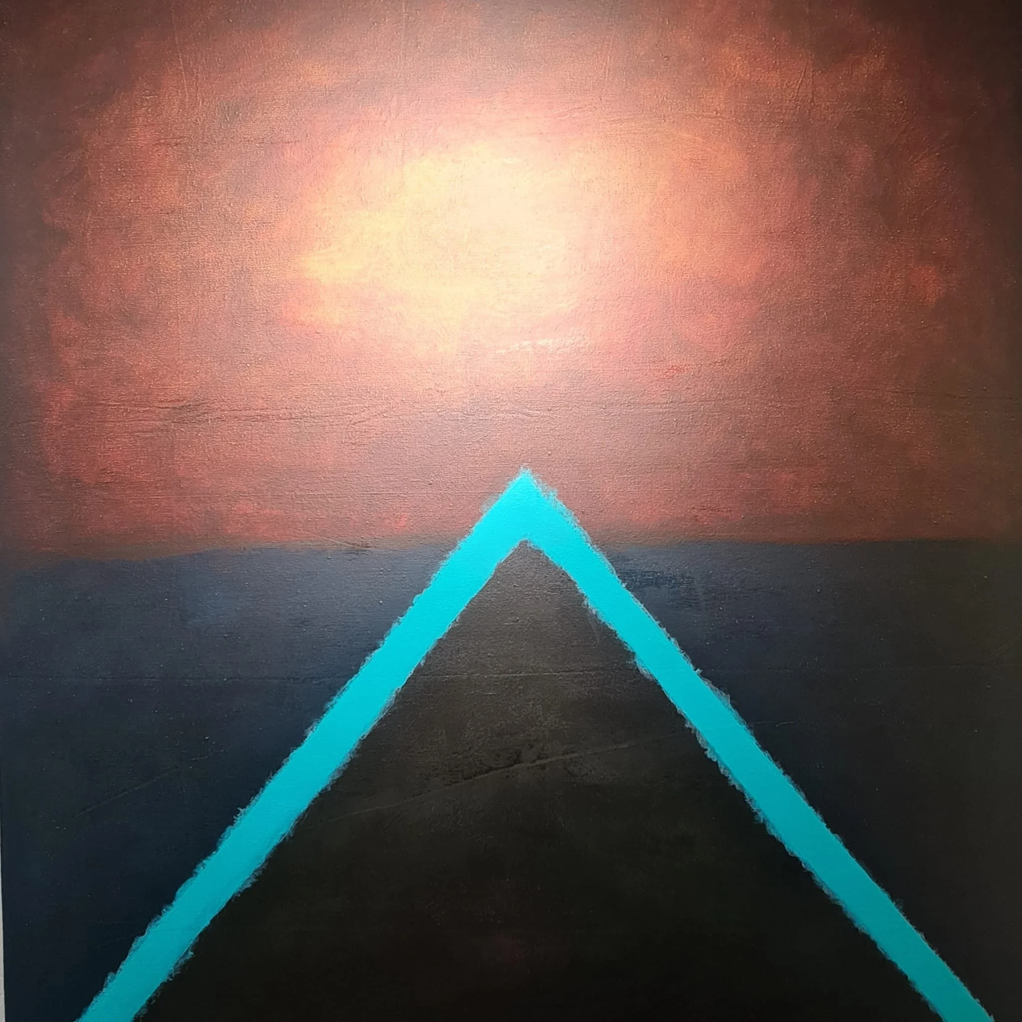A painting divided by chaotic browns and reds above, and drowning blues and black below. A vibrant triangle shape rises from the canvas splitting the midline, signifying transcendence out of negative emotions.