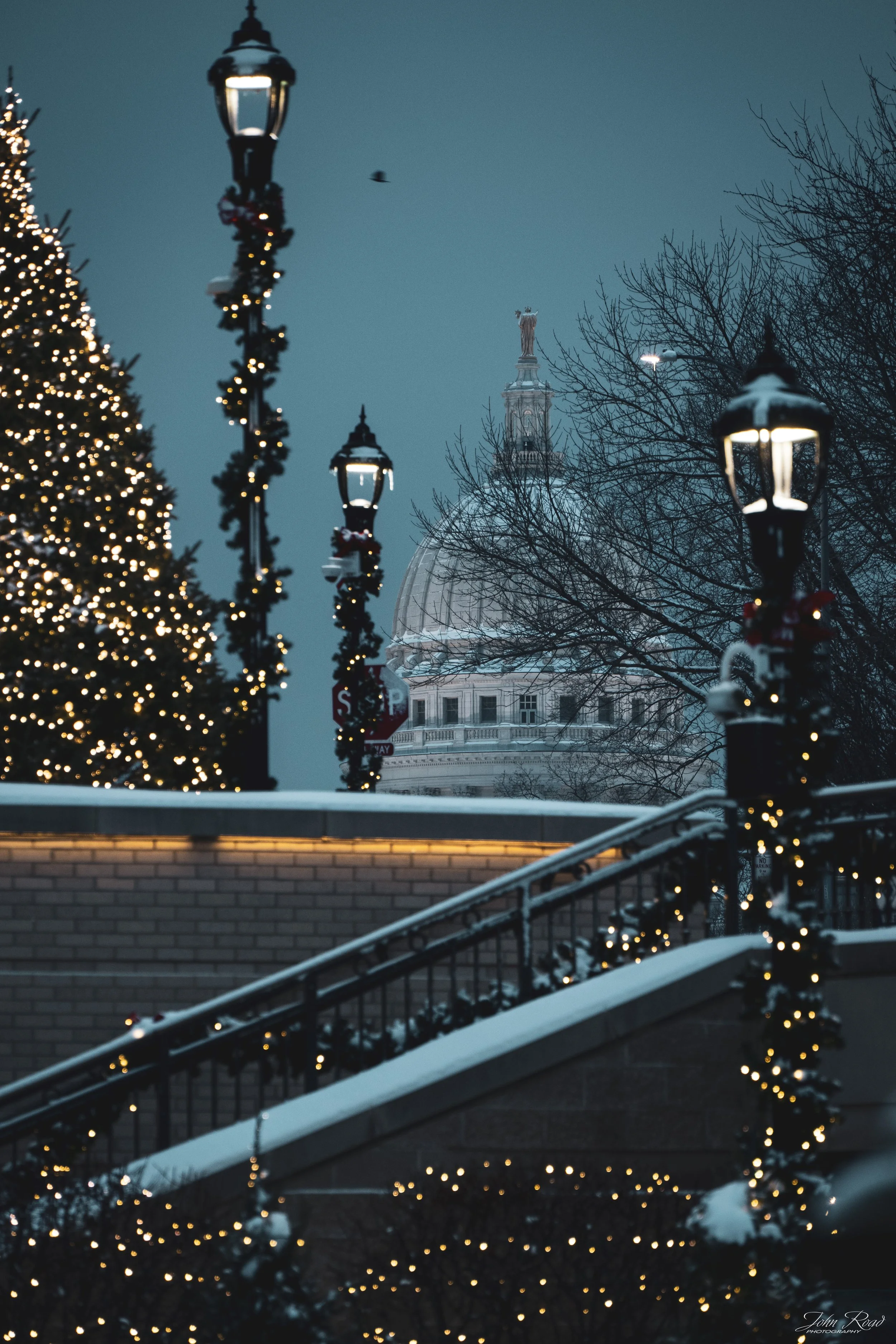 Holiday lights illuminating walkways and the Wisconsin State Capitol at morning in Madison, winter photograph by John Road.