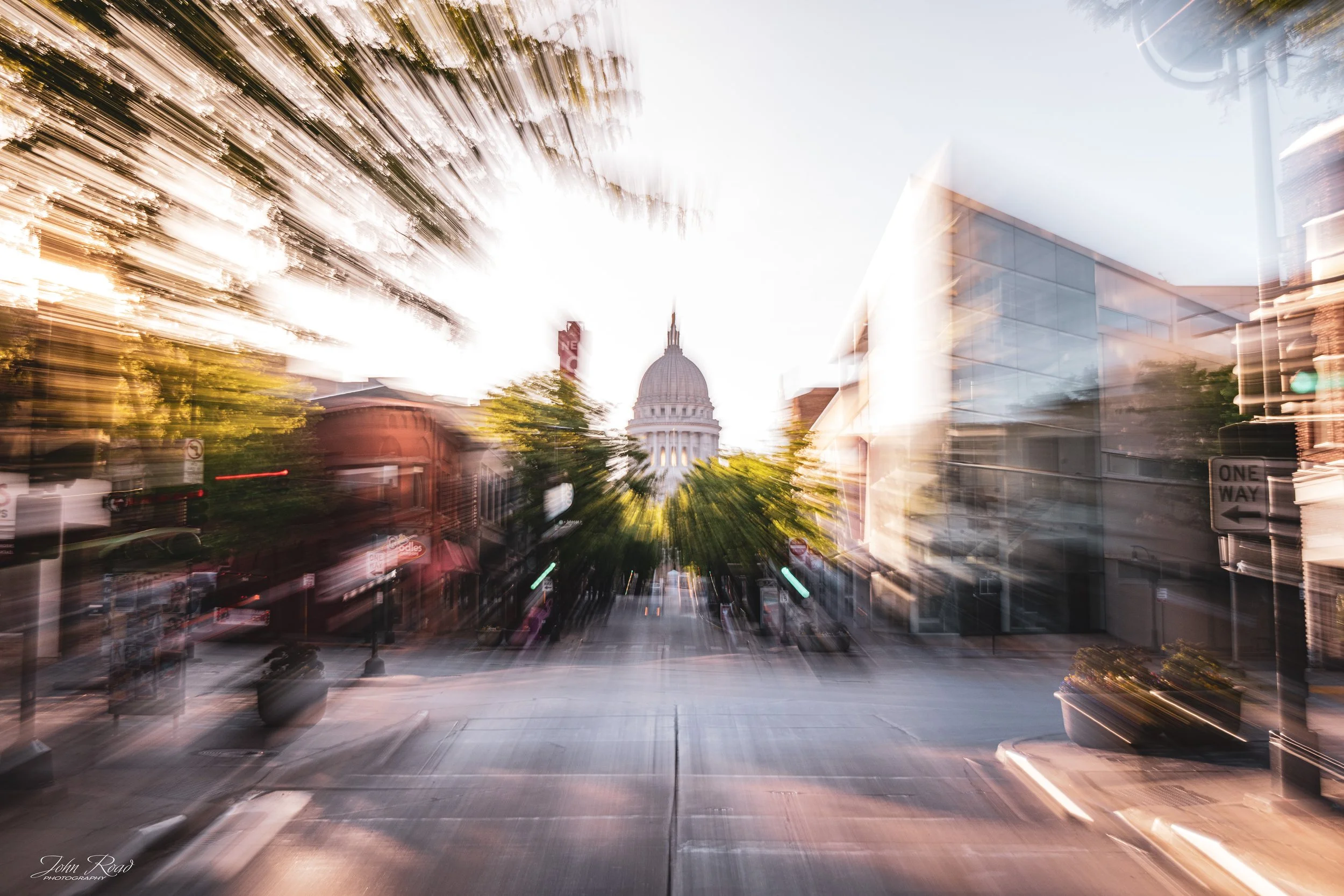 Creative zoom burst photograph of the Wisconsin State Capitol and Madison Museum of Contemporary Art in downtown Madison, Wisconsin.