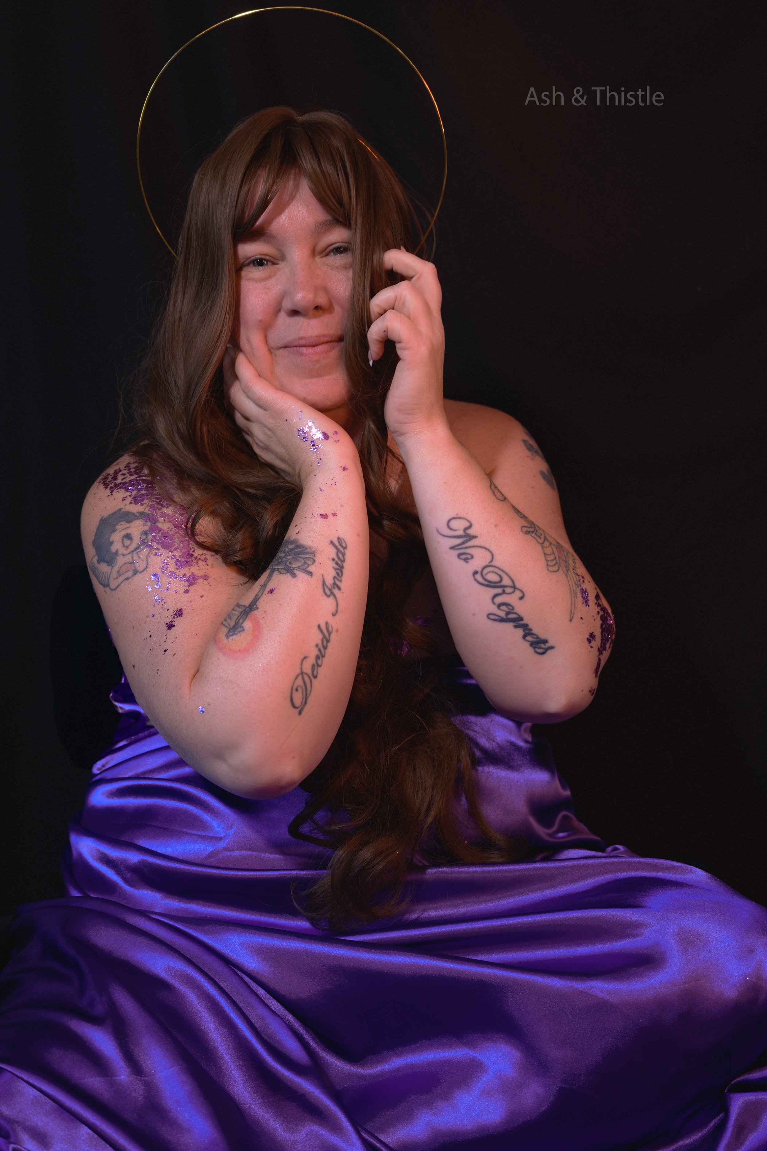 a woman in purple silk mastectomy boudoir in toledo ohio