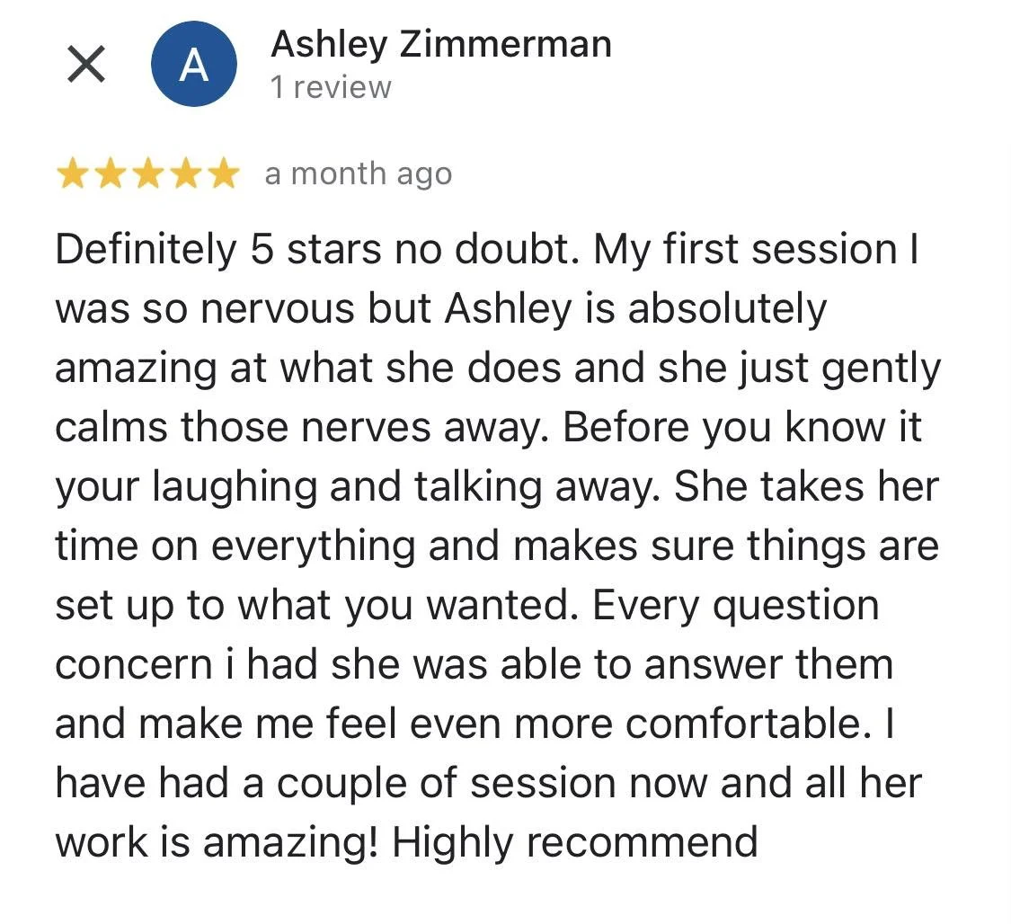 Screenshot of a five-star review for Ashley Zimmerman describing her calming and professional work in a session, praising her effectiveness and recommending her highly.