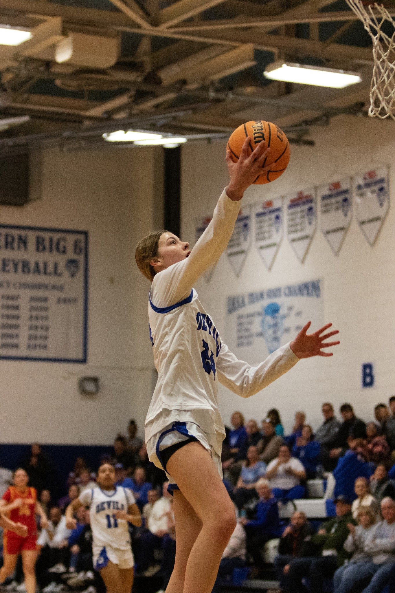 Thursday was a great day for QHS Girls Basketball  as they took on Rock Island. Starting the night off presenting Coach Dance with an award as the winningest coach in program history, the girls showed off how that title was achieved with a 58-47 Vict