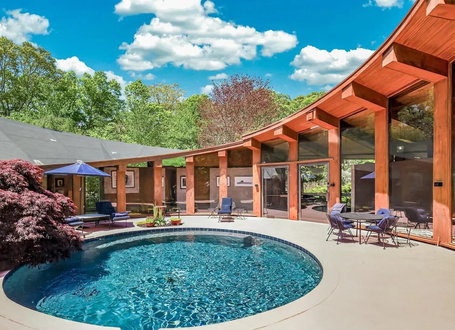 SHOOT LOCATION HRM19P | James Bond meets Slim Aarons | Saarinen style modernist home circa 1967 with paraboloid roof | soaring ceilings | authentic vintage kitchen | extraordinary garage | jennylandeylocations.com | HAMPTONS, NY