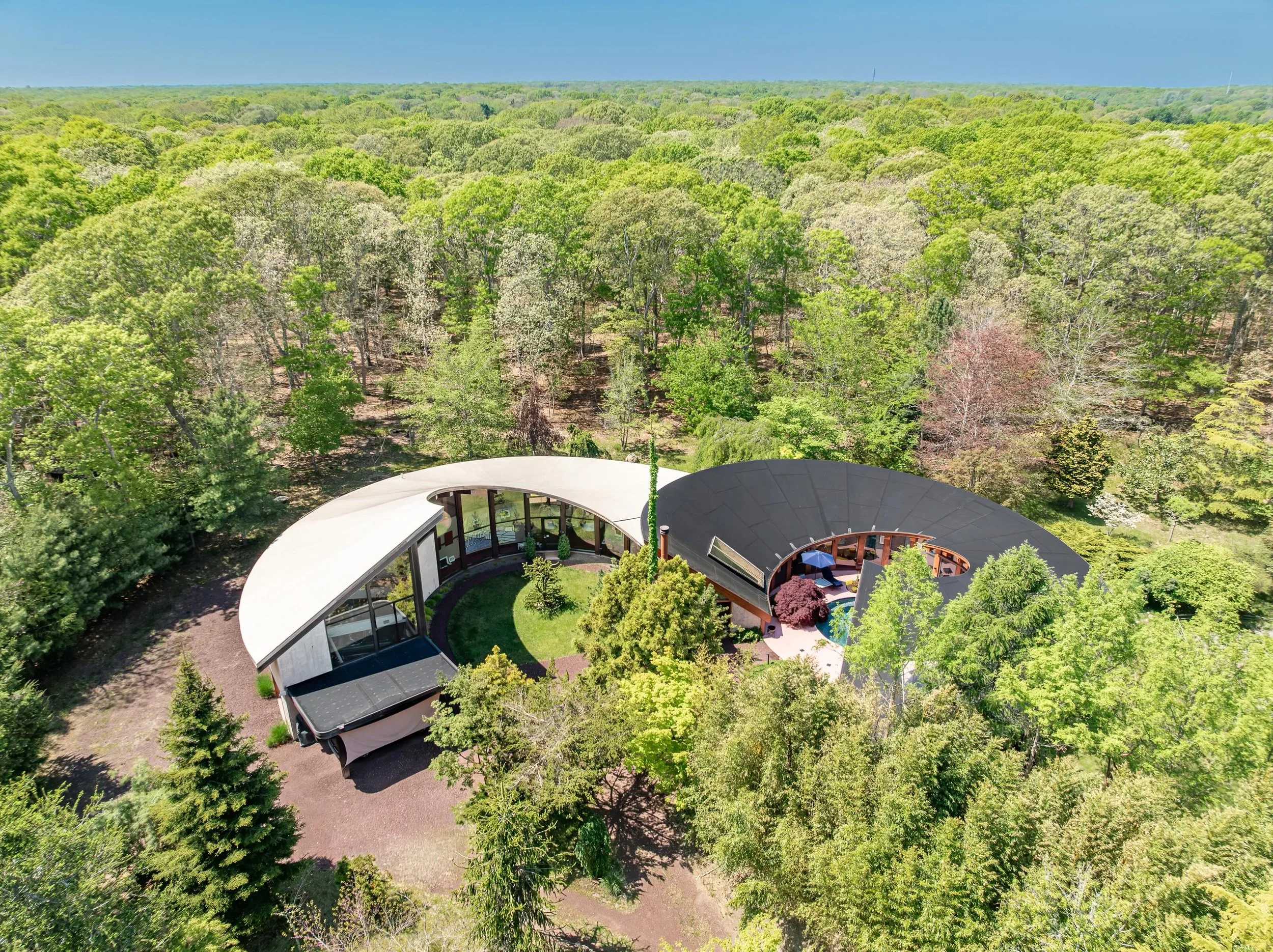 SHOOT LOCATION HRM19P | James Bond meets Slim Aarons | Saarinen style modernist home circa 1967 with paraboloid roof | soaring ceilings | authentic vintage kitchen | extraordinary garage | jennylandeylocations.com | HAMPTONS, NY