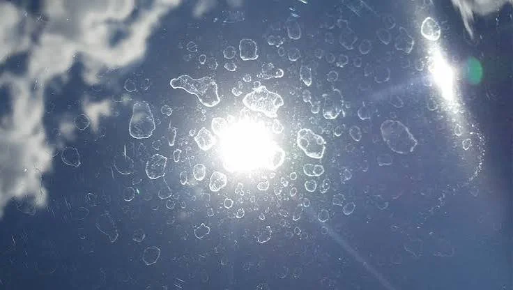 Hard water spots etched into paintwork after washing in sunlight