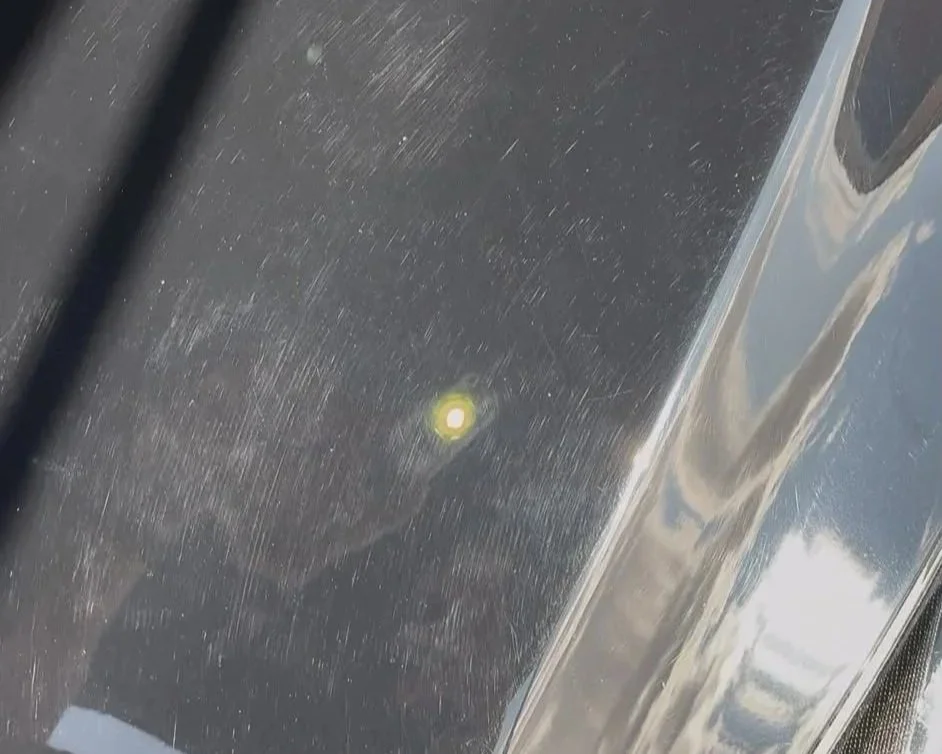 Swirl marks under inspection light before paint correction in Derby