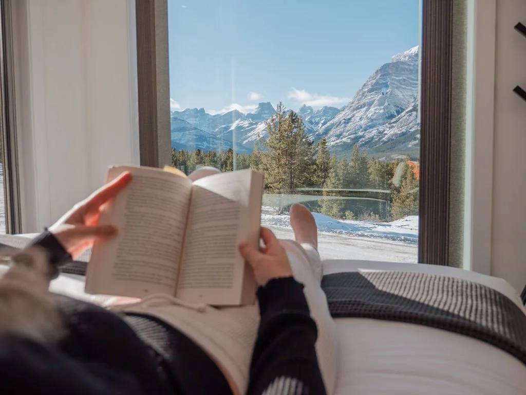 Skybox-reading on bed-mountain view.jpg