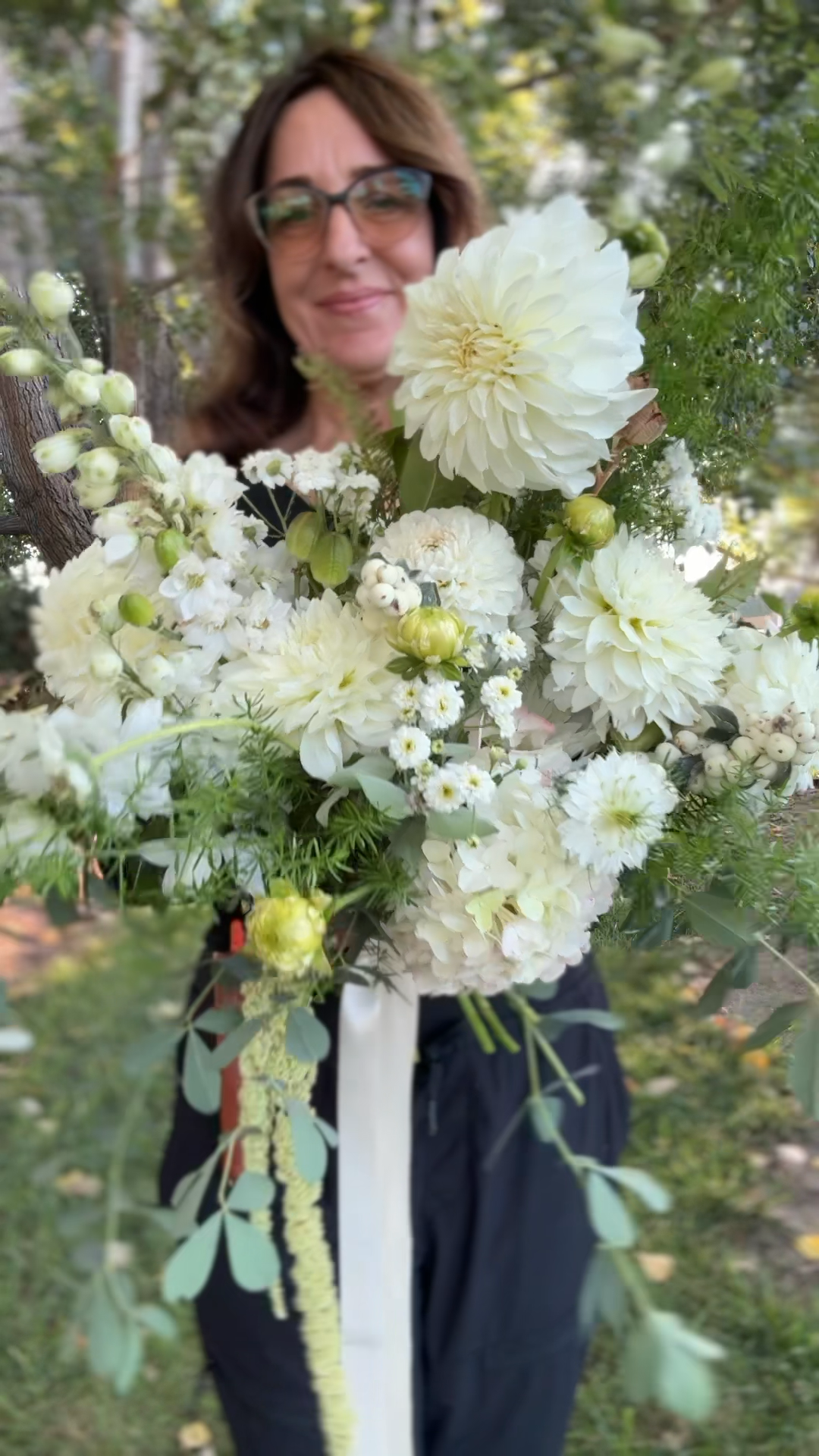 A bouquet of White Dahlias and Cosmos