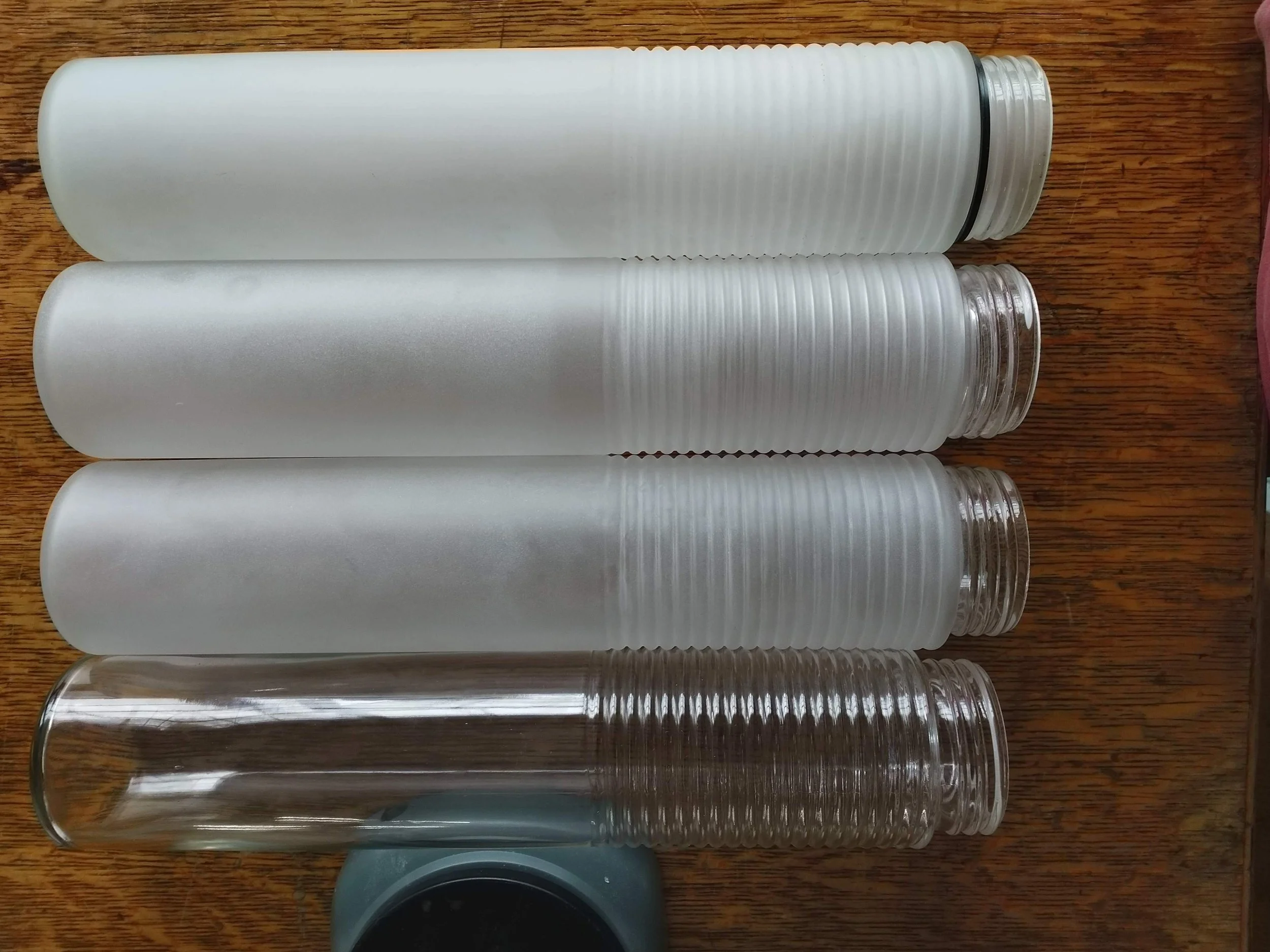 Glass Shade samples: Externally sandblasted, internally acid etched, and clear 