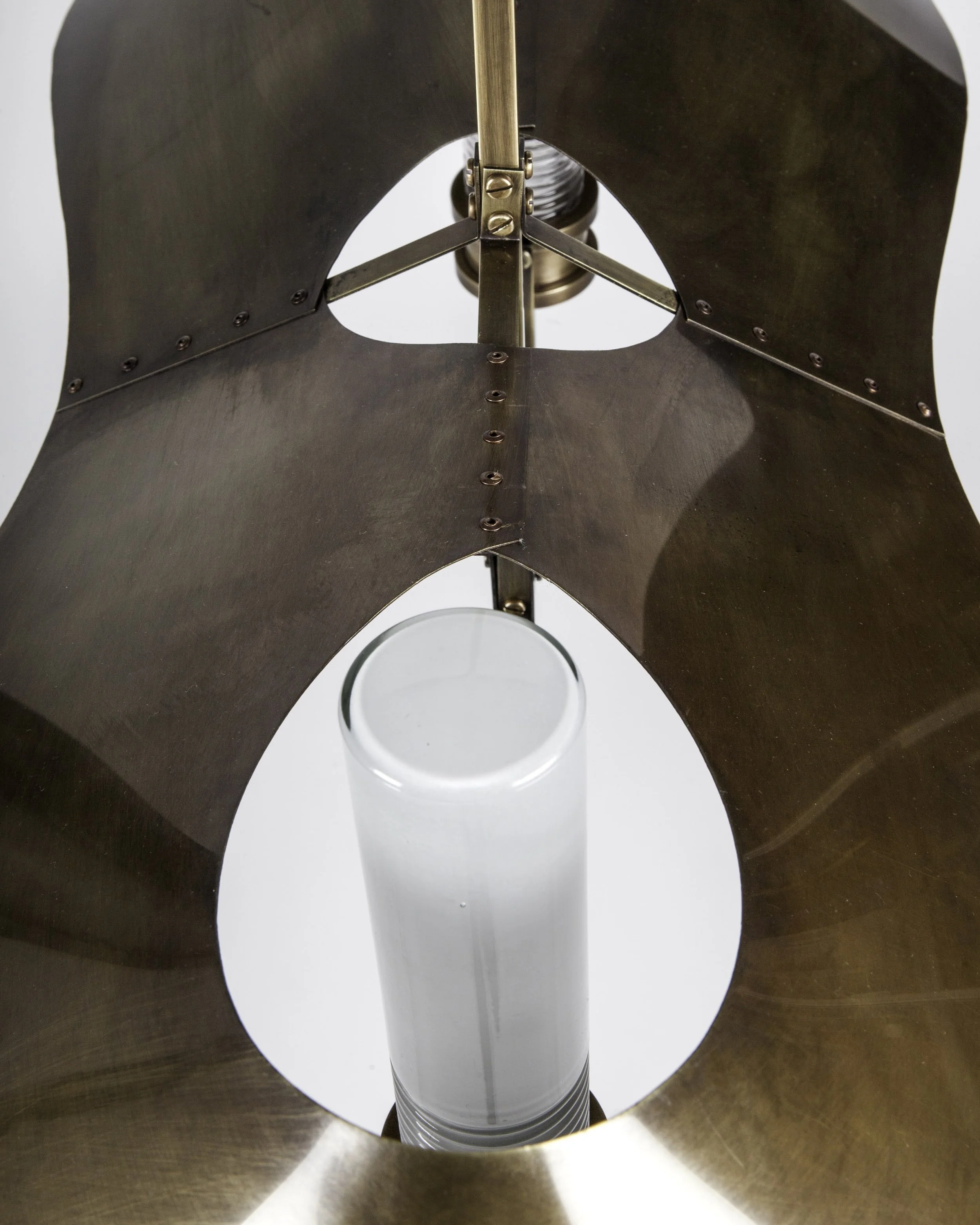 Top view of Glass Shade projecting through Brass Shade
(Photo credit: Remains Lighting)