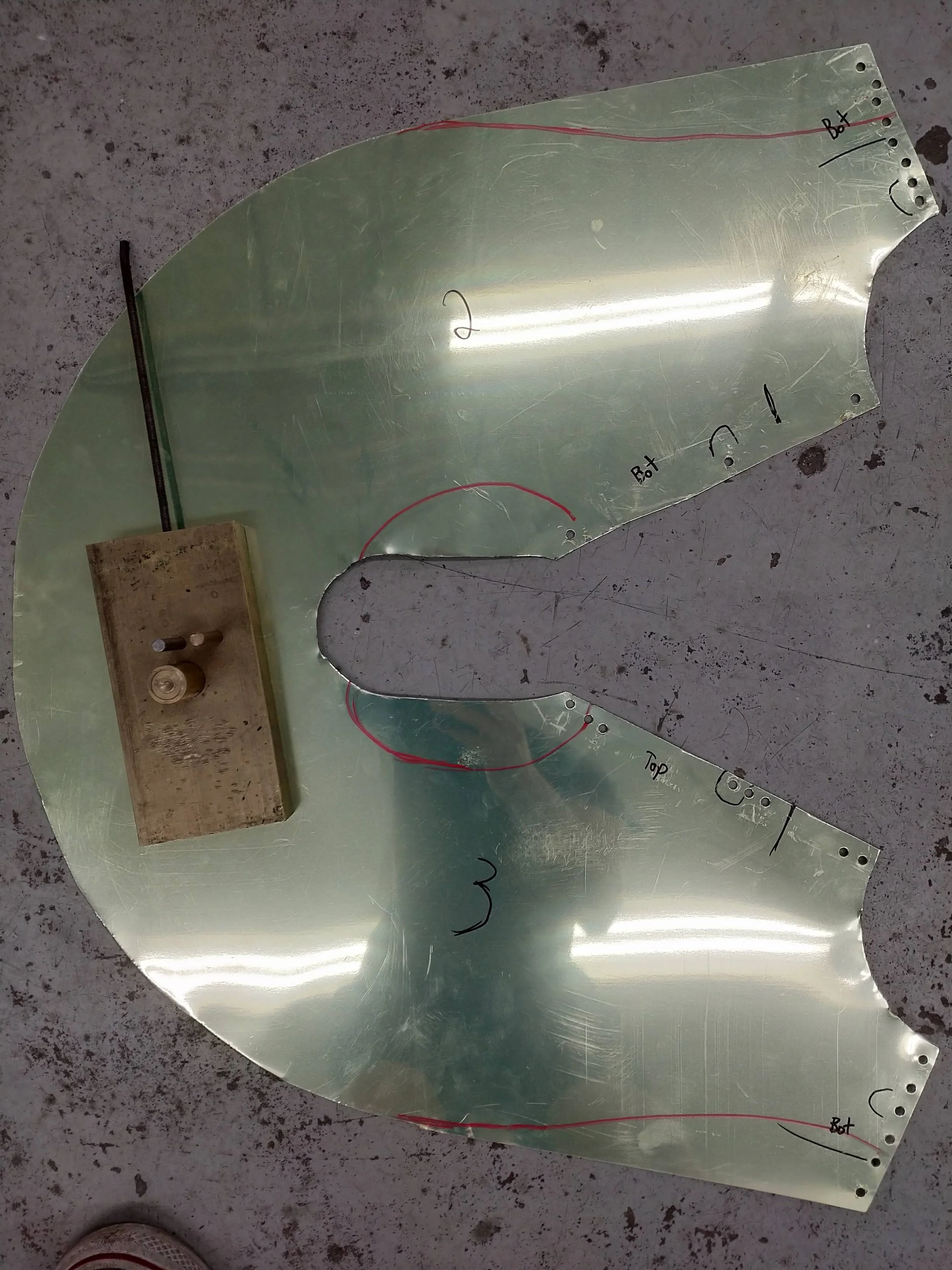 Flattened approved Shade prototype to be photographed for tracing in SolidWorks