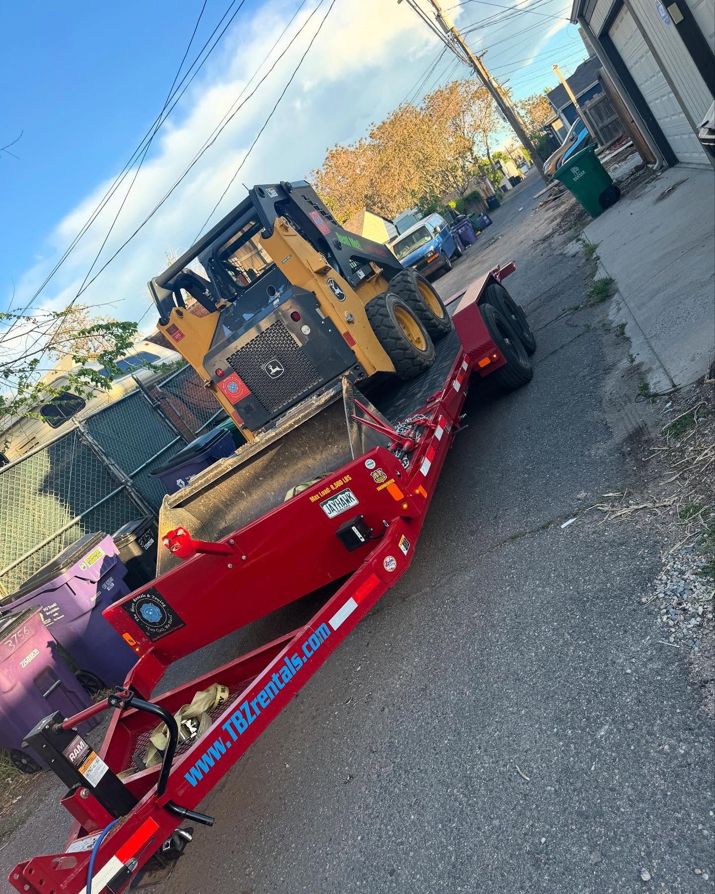 Need a machine down a tight alley way?! Not a problem for The Boys!! This home owner was doing a backyard remodel and it was inaccessible except from the alley side. He had a skid steer, 2 different buckets, and an Auger we dropped off. Parts of the 