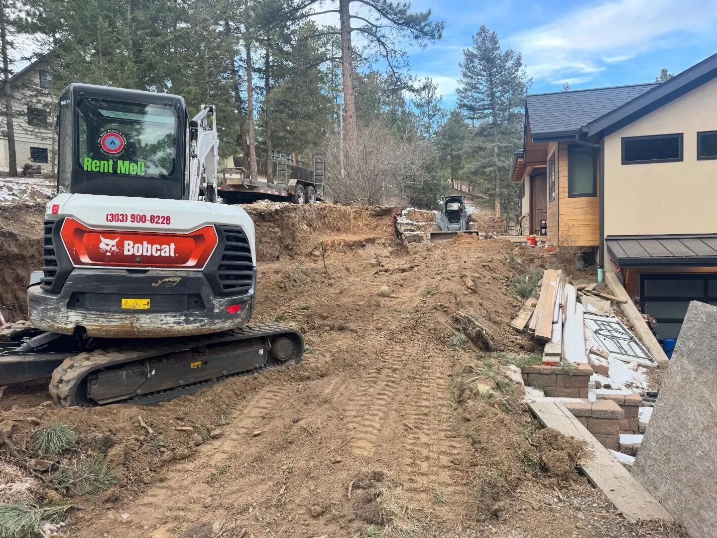 Works gotta get done! This week a contractor in Evergreen rented our Bobcat E42 excavator to install a retaining wall and pathway for their customer. Citing the machines power, cleanliness, reliability, and performance on their job site they were ecs
