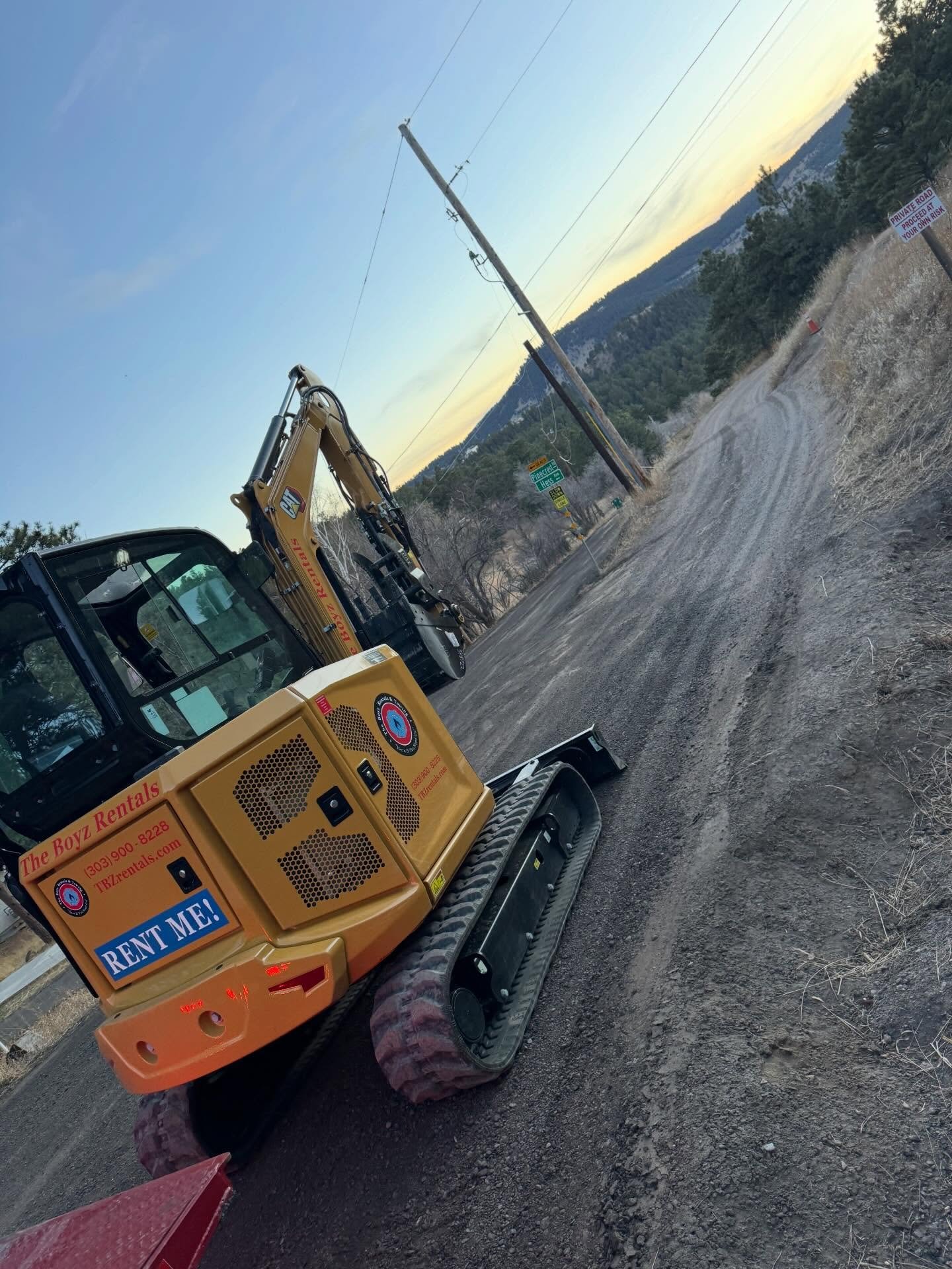Mountain Delivery!! Yesterday your team from The Boyz delivered one of our new CAT 304 excavators up to a renter in the Lookout Mountain region of Golden to complete some driveway repairs and drainage routing. After a brief &ldquo;how-to&rdquo; we se