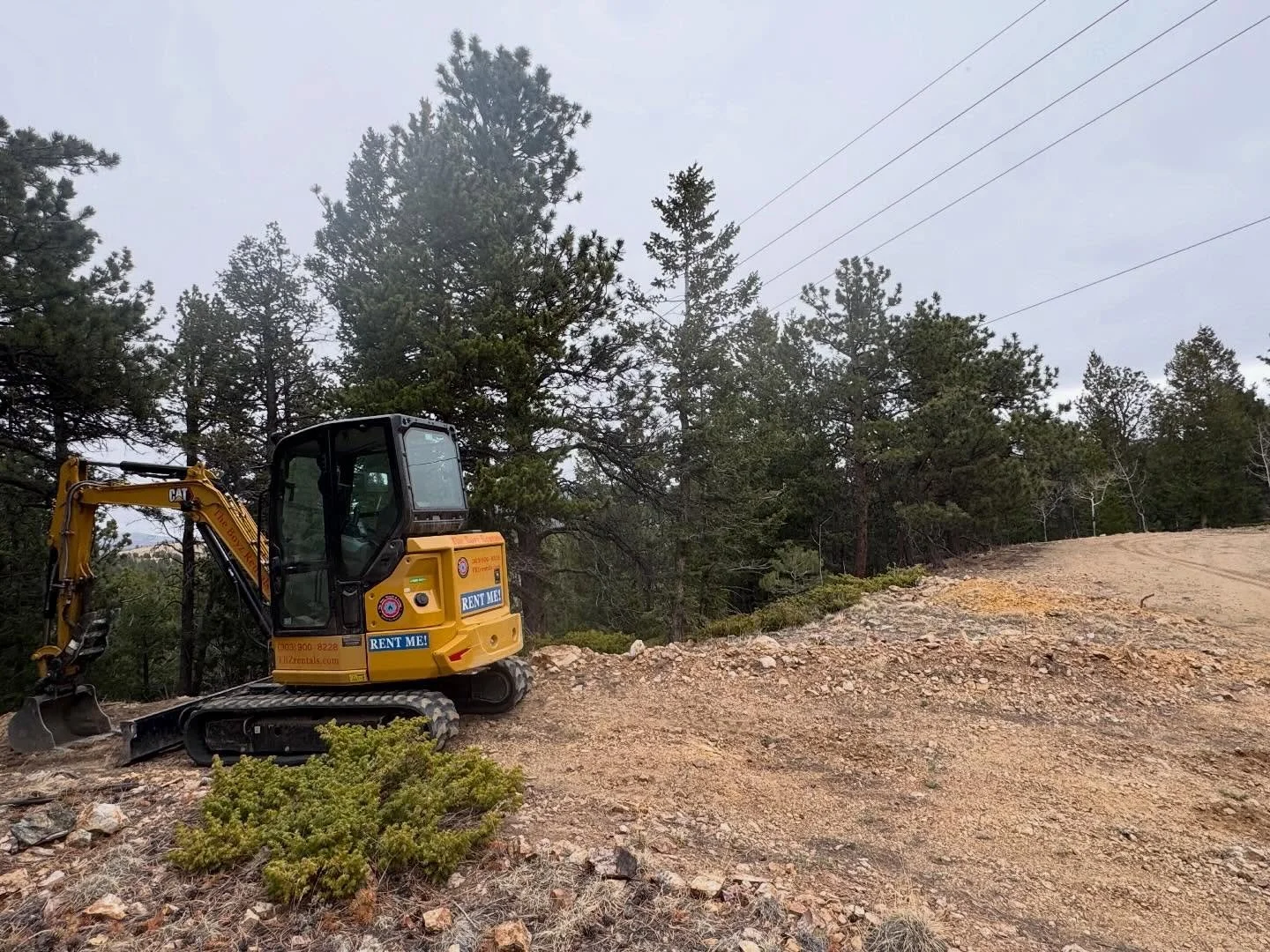Mountain Deliveries, racing the snow! Yesterday your favorite rental team woke up bright and early trying to race Mother Nature and deliver this CAT 304 excavator to our customer before the big April snow storm of 2026.. this property was down a remo