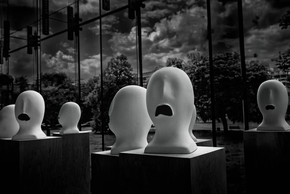 Sculptures in the museum’s lobby suggest silent, anguished witnesses—haunting and powerful.