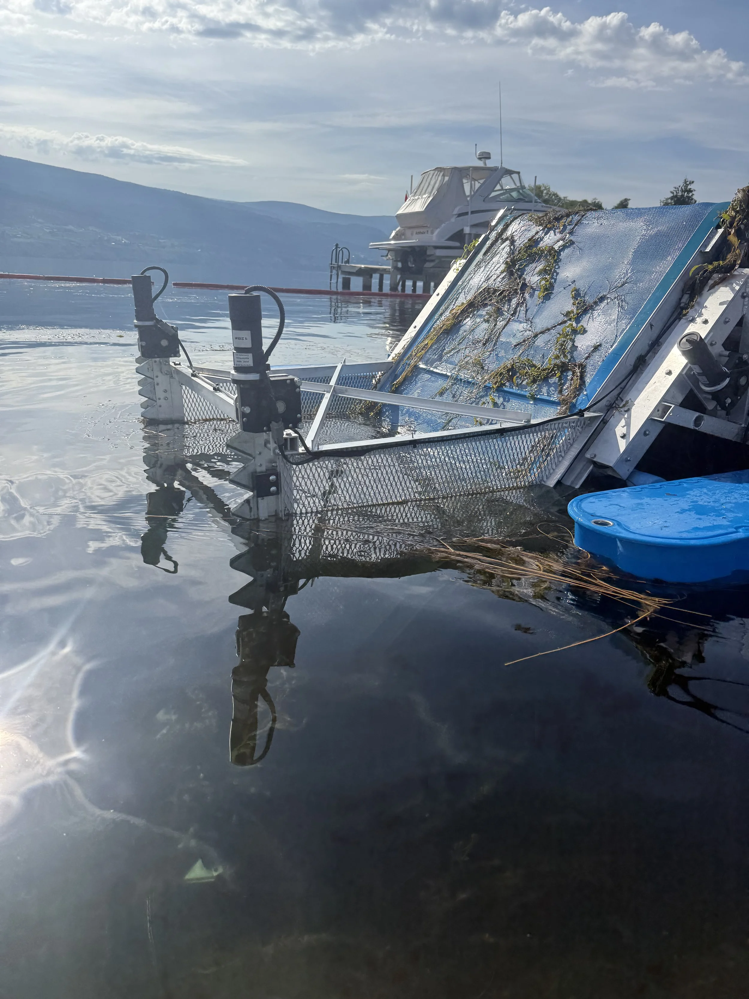 The Water Gator in action removing Milfoil from the Okanagan 