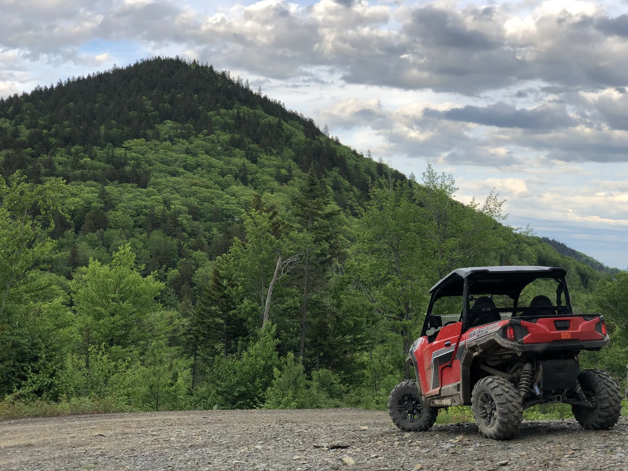 Red side by side with mountain in the background