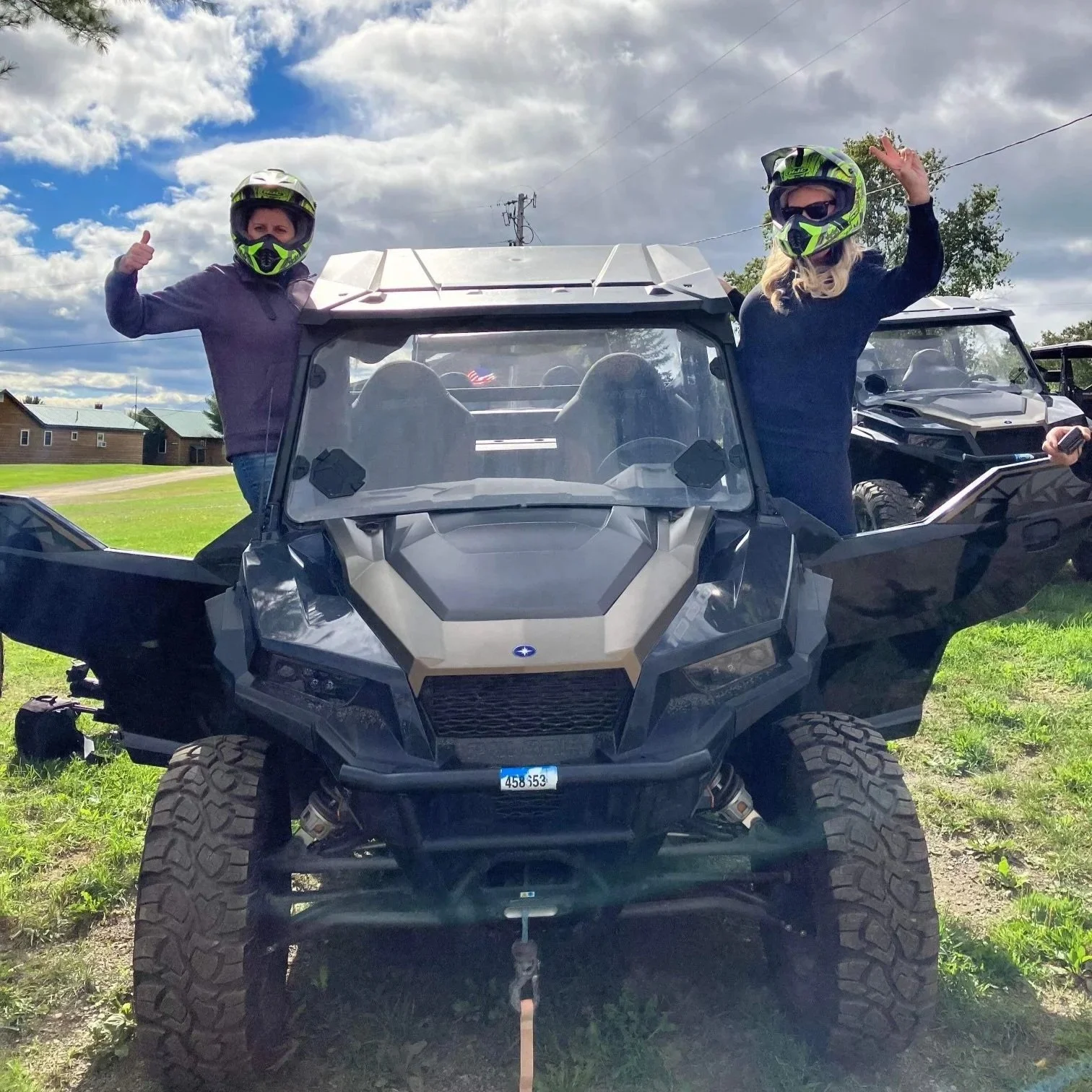 Two women enjoying a Side by Side Rental in Shin Pond