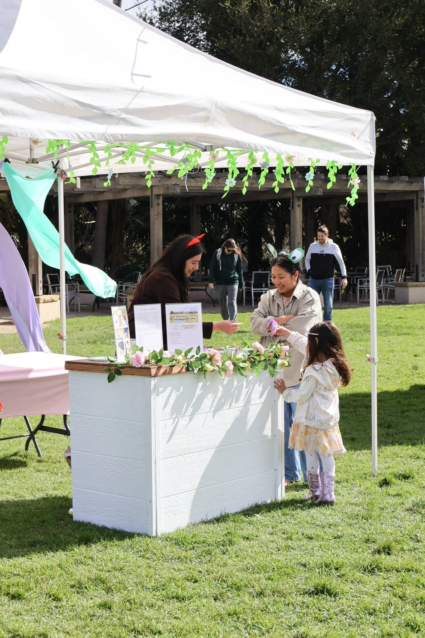 Laurie’s customers, Fernando and Kate embracing by the lake on their wedding day.