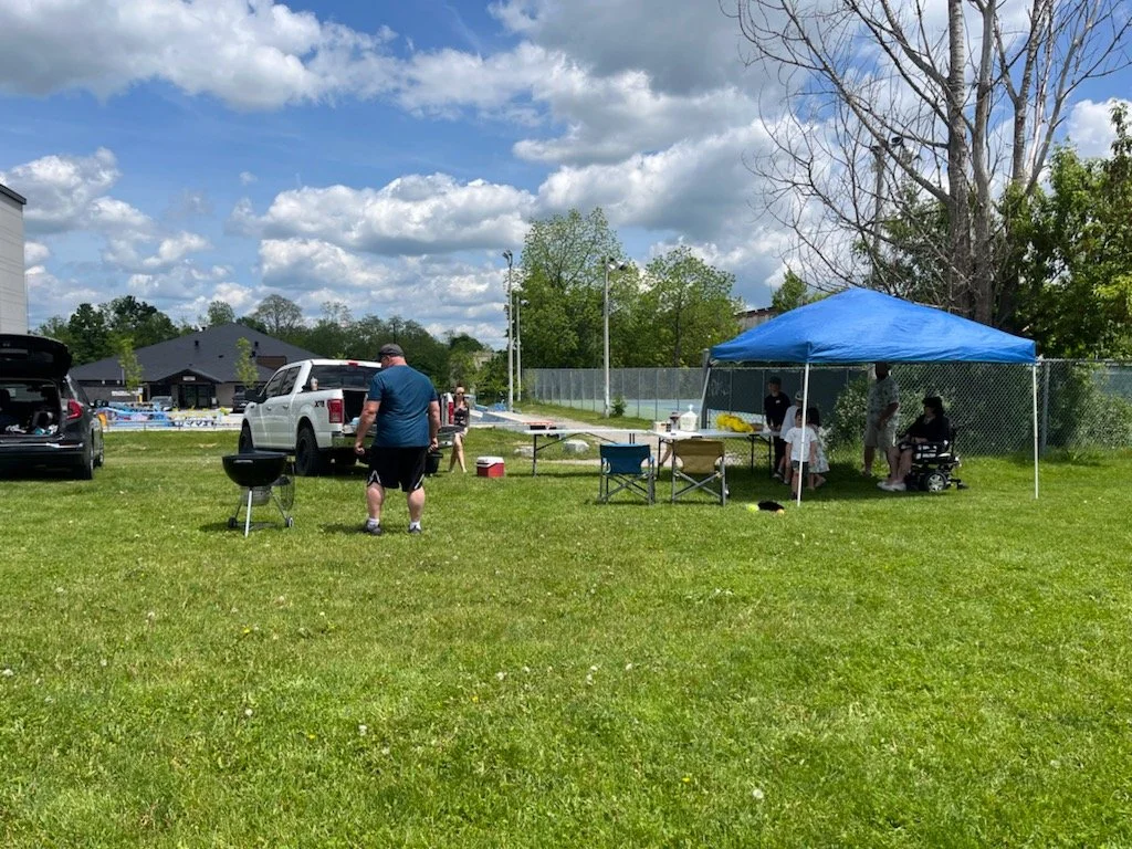 Hunt Terraces resident's family event in park May 26, 2024.jpg