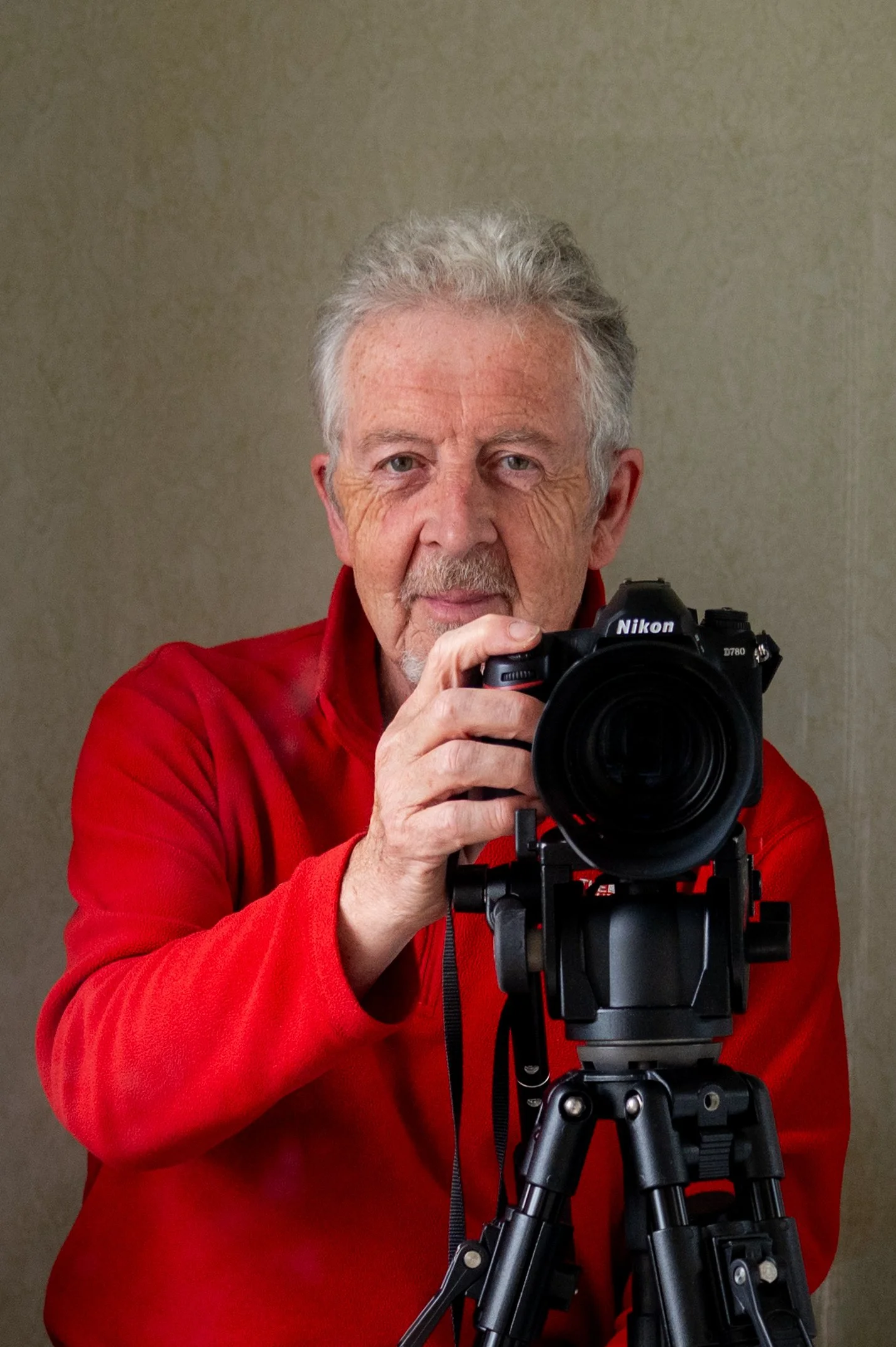 Photographer Paul Antony Clarke seen shooting with his Nikon camera on a sturdy tripod.
