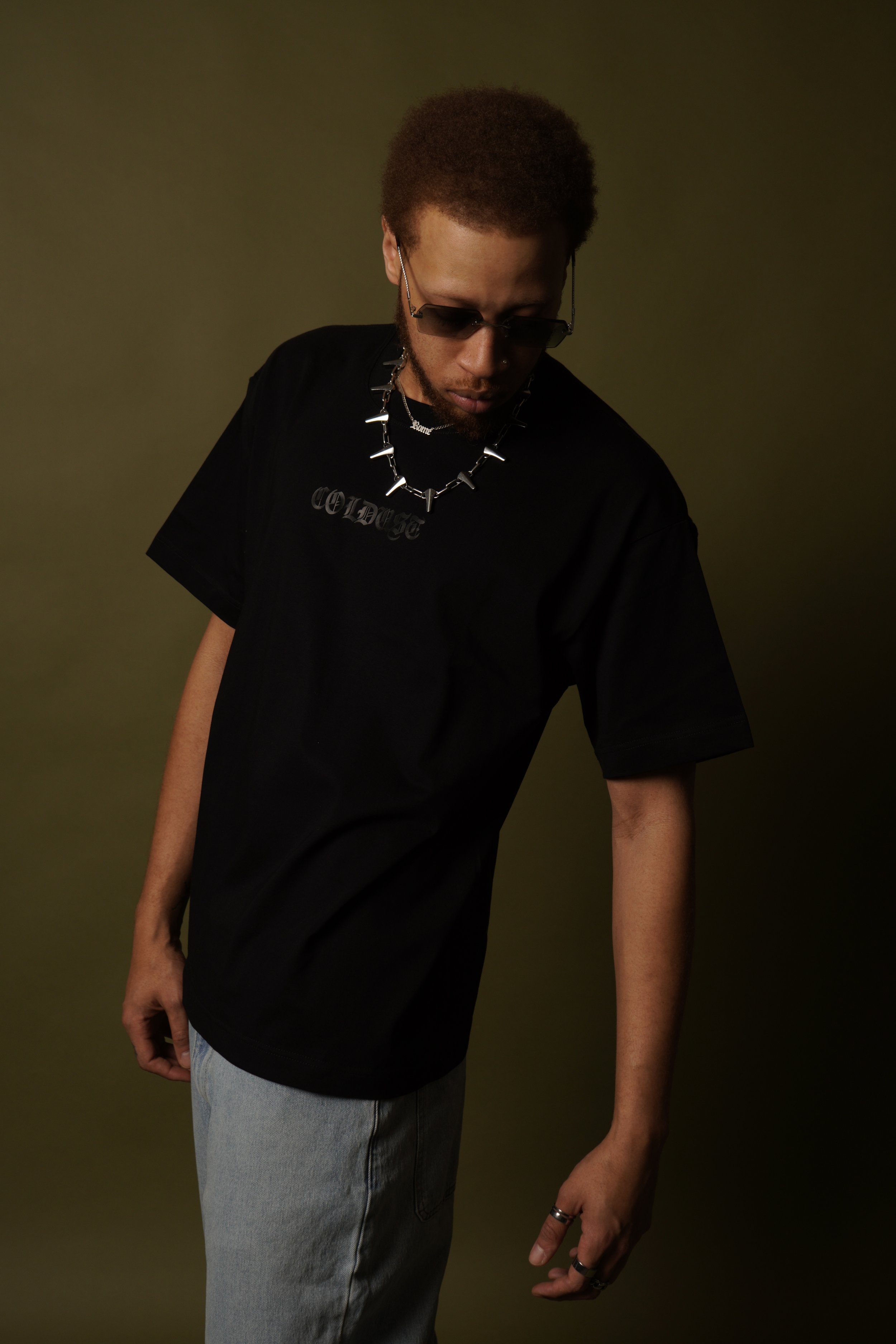 Coldust black oversized drop-shoulder t-shirt modeled for streetwear look