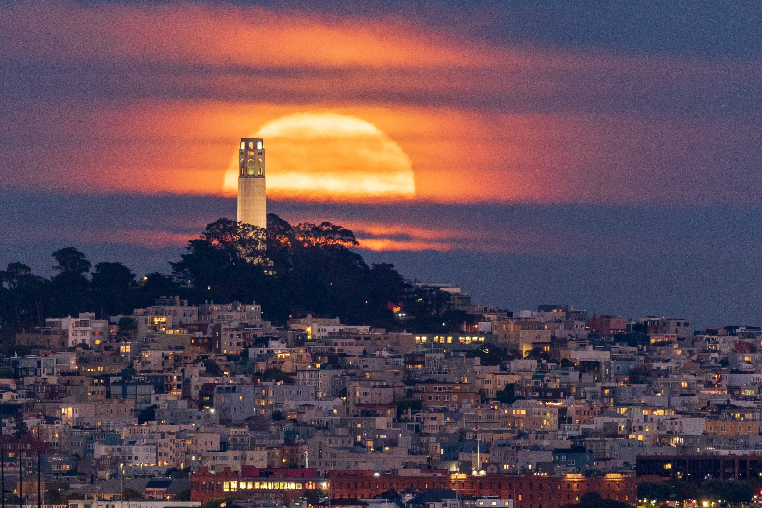 Moonrise behind Coit Tower, as seen from Fort Baker in Sausalito.
